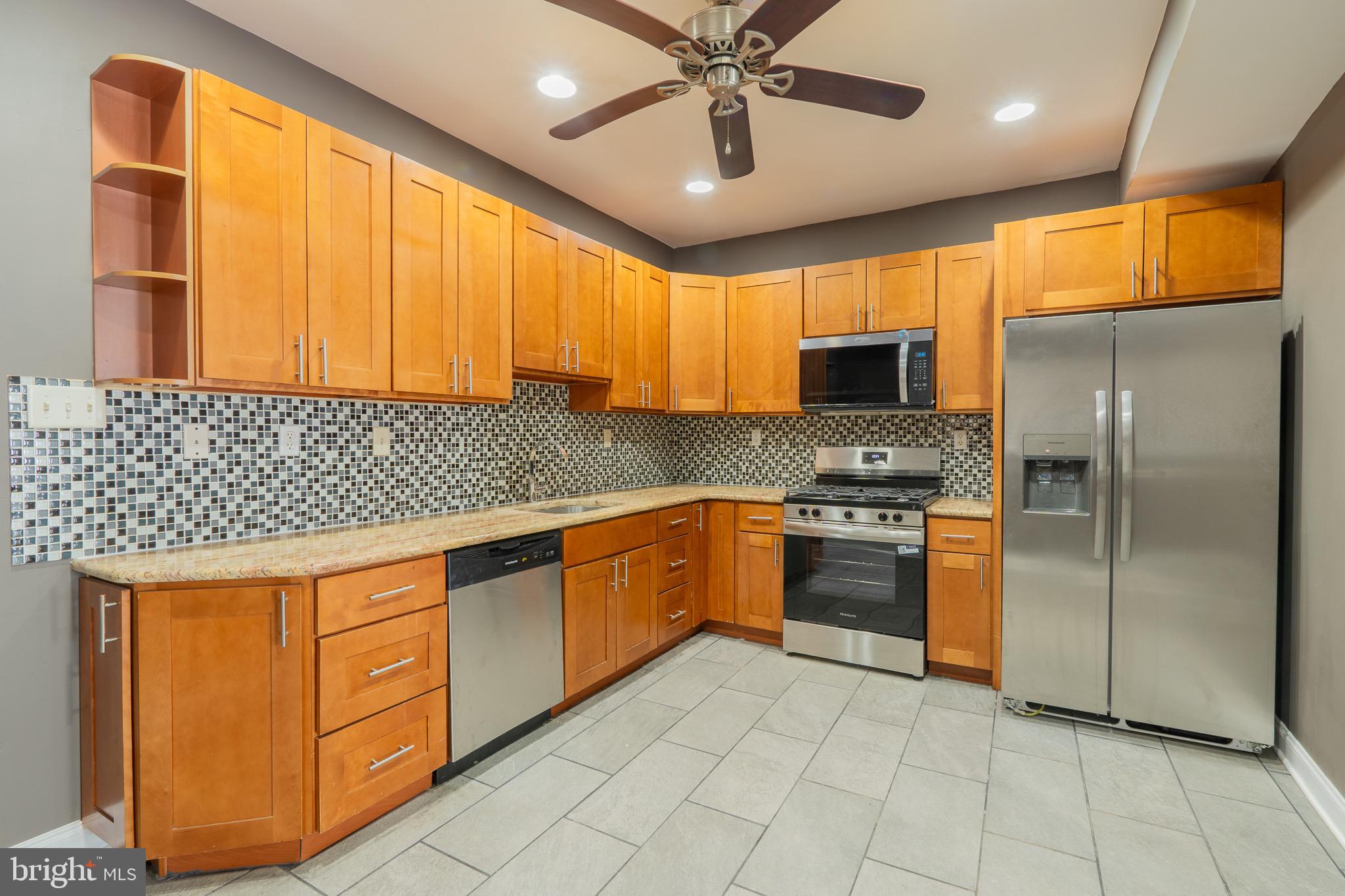Welcome to 4630 Edmund St, a beautifully updated 5-bedroom, 3-bath home located in the Frankford section of Philadelphia. This spacious property offers an open and inviting layout with modern finishes throughout.

The main level features a large living and dining area with updated flooring, recessed lighting, and plenty of natural light. The kitchen is a standout, offering ample cabinet space, granite countertops, stainless steel appliances, and room for meal prep and entertaining.

Upstairs, you’ll find generously sized bedrooms with great closet space and updated bathrooms. The home has been freshly painted and well maintained, making it move-in ready for its next owner.

Additional features include central air, multiple full bathrooms, and a semi-private fenced rear patio—perfect for relaxing or entertaining outdoors.

Conveniently located near public transportation, shopping, and major roadways, this property offers both comfort and accessibility.

Don’t miss your opportunity to own a large, turn-key home in a growing Philadelphia neighborhood. Schedule your showing today!