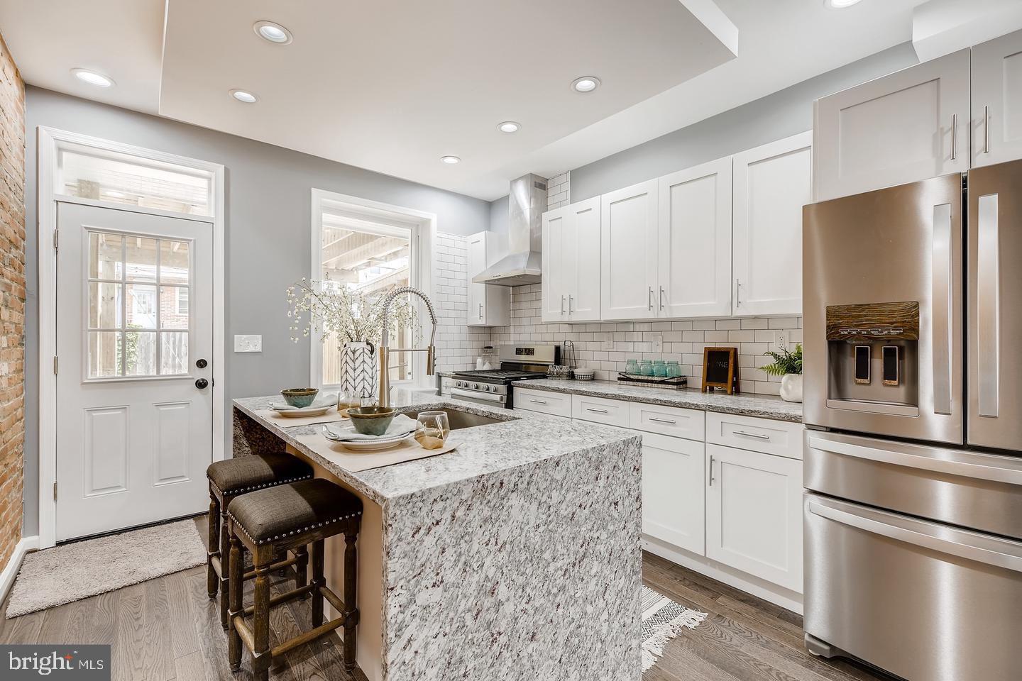 AMAZING NEWLY RENOVATED HOME!  ROOF TOP DECK! PRIVATE PARKING!  EASY STREET PARKING!  FULLY FINISHED BASEMENT!  THIS THREE BED THREE BATH HAS HARD WOOD FLOORS, FULLY RENOVATED KITCHEN WITH NEW APPLIANCES, GRANITE COUNTER TOPS!  PROFESSIONALLY MANAGED!  ONLINE PAYMENTS!  SCHEDULE YOUR SHOWING TODAY!