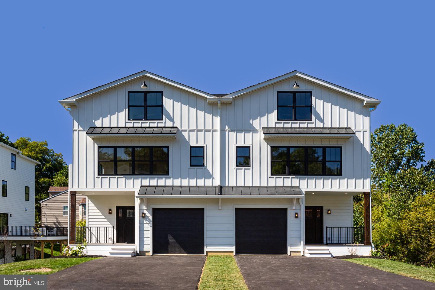 Welcome to The Enclave at St David's. Your new home is waiting. This home is Built and Move In Ready. 980 Henry Avenue is part of nine new construction residences in a private enclave near the heart of downtown Wayne. A collection of eight carriage homes and one single-family home, they feature spacious interior living with thoughtful finishes throughout. Live effortlessly between the sanctuary of home and the vibrancy of downtown Wayne’s thriving restaurant scene. This beautiful carriage home is located in a quiet cul-de-sac and has 3490 square feet of living space. Four bedrooms, three full baths, and two half baths. The first floor features 9 foot ceilings in the open concept kitchen, dining, living room. A perfect spot to entertain friends and family. Off of the dining room you’ll find your outdoor entertainment area. A sprawling 350 square-foot deck that overlooks the beautifully landscaped community. On the second floor the large primary suite has oversized windows and is flooded with natural light. The primary en suite includes a wet room with shower, hand shower and soaking tub. The walk-in closet completes the space. One additional bedroom, full bath, and laundry space complete this floor. Walk up to the third-floor for two additional bedrooms, full bath, as well as a large recreational room. On the lower level, you’ll find a large living and entertaining space. Large enough for a TV area, bar, and even a pool table. From this space you can walk out to your ground floor patio and back yard. James Hardie siding, black Andersen windows, Azek Vintage Collection decking, Shaw Couture white oak wide plank flooring, GE profile appliances. Located in the award-winning Tredyffrin Easttown school district. Close to the train station, freeways, and King Of Prussia shopping and dining. Don’t miss this opportunity to live in a beautiful new construction home, in a top school district in the state, close to all of the amenities that Wayne has to offer. This home is built and move-in ready. All you have to do is pack your bags. Taxes TBD. The development is 90% complete and no exterior construction.