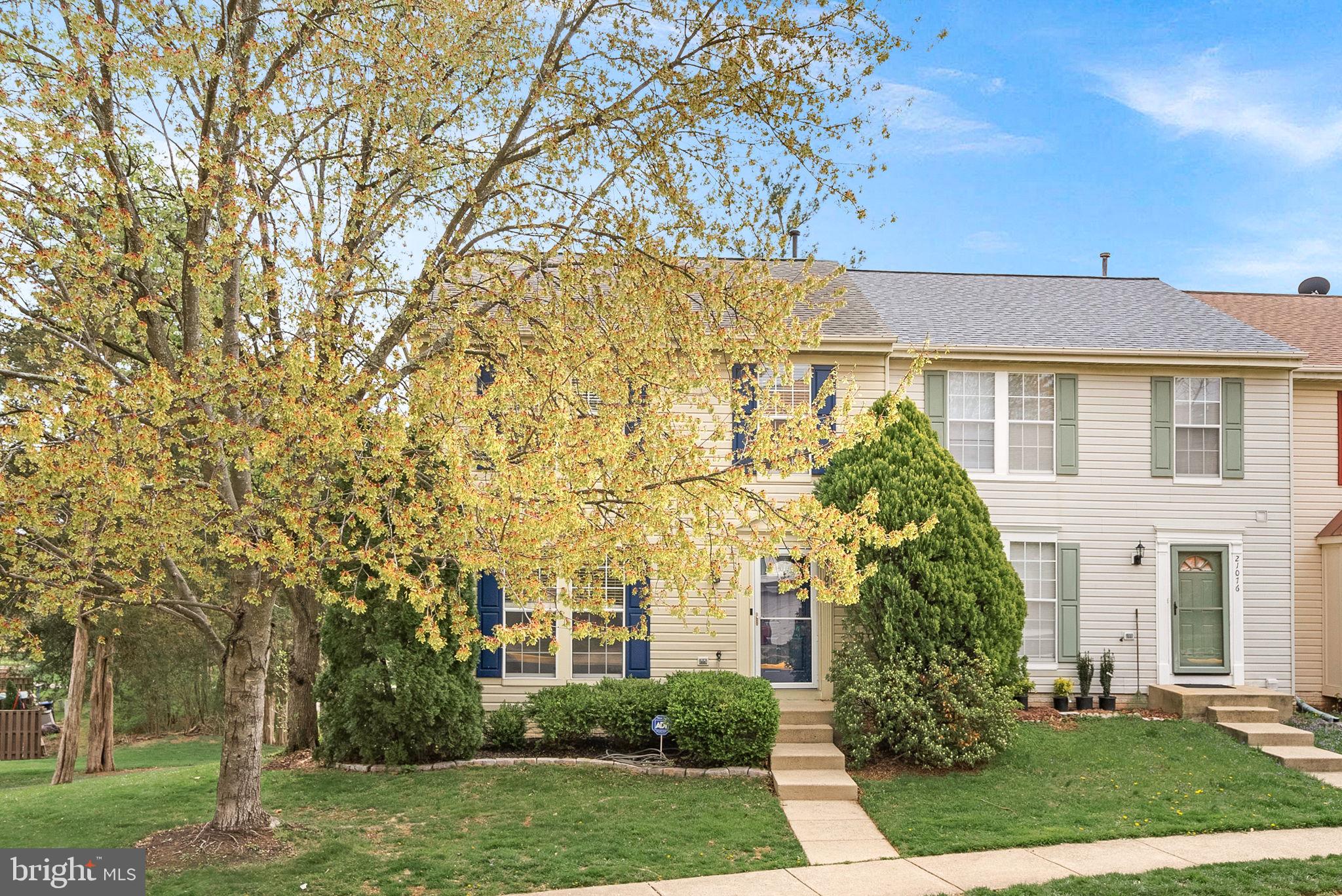Welcome to 21074 Cornerpost Square, this end unit property offers one of the largest townhome backyards in the Ashburn Farm community and it backs to common area so you won't feel boxed in by other homes!  

As you step inside, you'll be greeted by a spacious living room, ideal for entertaining guests or kicking back and relaxing . The lower level recreation room features a cozy fireplace, providing warmth and ambiance during cooler months. The well-appointed kitchen includes a center island with granite counter tops and is complemented by a convenient powder room on the main level.

This home boasts three generously sized bedrooms, each designed with comfort in mind. The primary suite offers a luxurious walk-in closet and an en-suite bathroom, creating a private retreat.  Two additional bedrooms and one  full bathroom round out the upper level ensuring convenience for all.

Experience seamless indoor-outdoor living with a large deck overlooking a beautifully landscaped yard, where mature trees provide a tranquil setting. The finished basement offers additional living space, perfect for a home office, gym, or recreational area.

Enjoy the community amenities, including a pool, tennis courts, and a basketball court, all designed to enhance your active lifestyle. With 2 assigned parking spaces, ease and convenience are at your doorstep.

Discover the perfect blend of elegance and practicality at 21074 Cornerpost Square. Your dream home awaits!