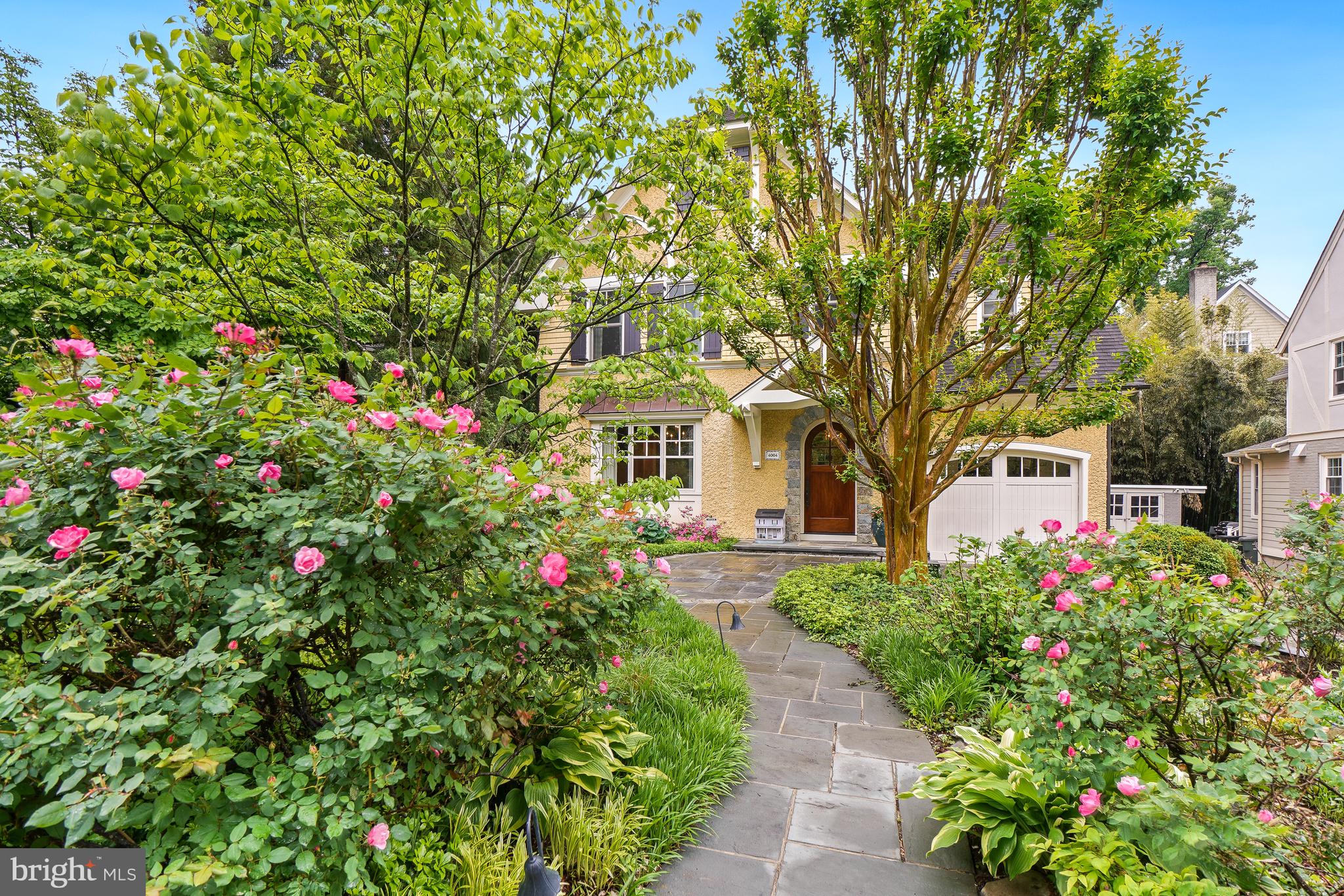 Some homes simply have it — that rare combination of historic character and modern craftsmanship that stops you mid-scroll and makes you need to see it in person. 4004 Underwood is that home.
From the moment you arrive, the pebble dash stucco façade — framed by mature, lushly layered landscaping of flowering trees, roses, peonies, and azaleas — signals that something special awaits. Follow the curved walkway to a custom-designed solid wood entry door, and step inside.
Rift-and-quartered character grade white oak floors carry you through all three above-grade levels, and the details that greet you at every turn are the kind buyers spend years searching for: rich moldings, bespoke built-ins, a coffered ceiling and antique fireplace mantel in the family room, and a soaring cathedral ceiling that transforms the primary bedroom into a true retreat. On the lower level, radiant heated polished concrete adds a sleek, modern counterpoint — while the mudroom’s handmade hexagonal French terra cotta tile adds one more layer of unexpected delight.
The kitchen is a craftsman’s statement. Solid ash cabinetry by Wm Ohs of Colorado — one of the country’s most respected custom cabinet makers — pairs with honed Absolute Black granite countertops for a look that is simultaneously timeless and refined. A custom pine built-in hutch anchors the breakfast area with warmth and practicality.
Then there is the screened porch — and once you see it, you will understand why it may be the home’s most beloved space. At 14 by 18 feet, with mahogany flooring and a bead board cathedral ceiling, it is the kind of room that turns summer evenings into something worth savoring.
Practical considerations are equally impressive. Finding two garage spaces in the Town of Chevy Chase is itself a rarity. The attached garage includes a 220-volt line for EV charging, while the detached original garage has been thoughtfully reimagined as a garden shed, storage space, and entertaining room complete with custom sliding barn doors — flexible square footage that grows with your needs.
And underpinning it all: a dual-zone geothermal HVAC system that delivers exceptional year-round comfort while also assisting with water heating — an investment in both sustainability and long-term savings.
4004 Underwood is not a house that was renovated to look like something special. It is something special — a superior quality, recently constructed home built on a century of character, elevated by craftspeople who cared about every last detail. Some homes you tour. This one you remember.
OPEN SATURDAY & SUNDAY 1-4