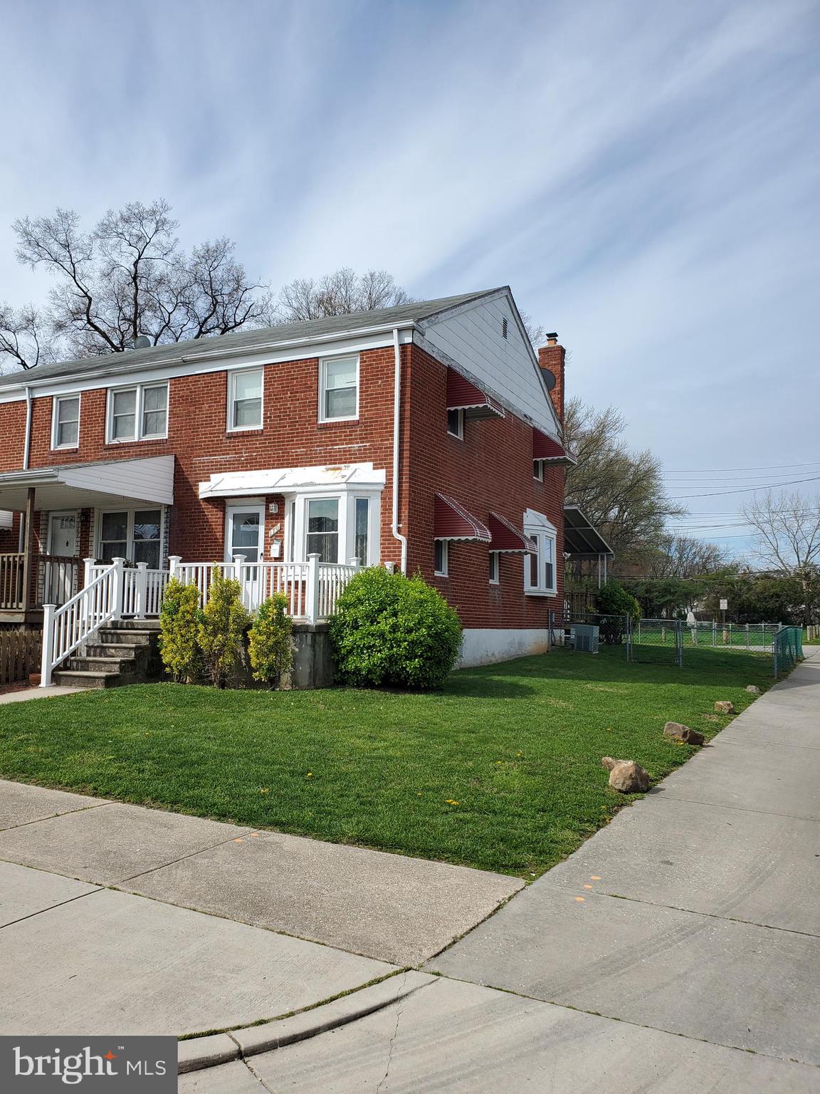 Come take a look at this end unit that has a small park to the rear. This section of townhomes only has 3 units to the row and is only a few doors down from the elementary school.  This home features replacement windows, open front porch,  covered rear deck and a partially finished basement which also has a second full bathroom. Home is being sold "as is", owner will not do any repairs.  This home is perfect for an investor or a 203k loan. Easy to Show!