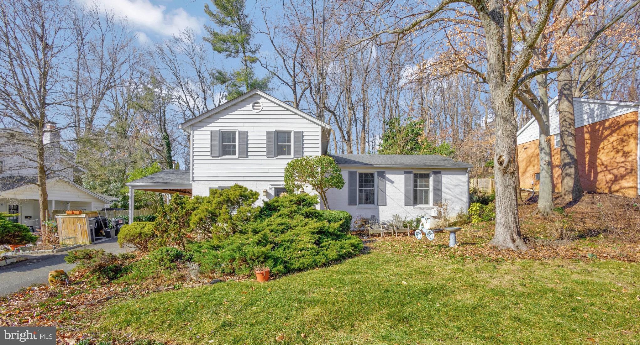 UPDATE:  ALL OFFERS DUE BY MONDAY 2/12 AT 8 PM.  Here's your chance to move into a beautiful 5 BR Split-level home right in the heart of the highly desirable SLEEPY HOLLOW RUN neighborhood.   The main and upper levels feature beautiful hardwood floors.   Floors on main level were recently refinished.    The living room is extra long and bright with 2 large windows overlooking the front yard.  The separate dining room can accomodate large dinner parties and walks out to the back patio for easy entertaining.  Next to that is the large, sunny kitchen looking out at the serene backyard and all the birds. Go a few steps down to the renovated family room with brand new LVP flooring, wood burning woodstove fireplace and beautiful built-in custom bookcases on each side of the fireplace.  Attached to the family room is a new screened in porch with cathedral ceilings, skylights and windows all around. You will bring nature right into your home, but without any bugs!  The kitchen, family room and porch will surely become the heart of this home for you.   Also on the main level, there is a fifth bedroom that  is currently being used as a home office, but could  easily be converted back to a bedroom. 
A powder room completes this level.   Heading upstairs, you'll find 4 good-sized bedrooms and 2 full bathrooms. The primary bedroom is ensuite, has a large custom closet and ceiling fan.   The renovated bathroom has a double vanity,  a beautiful  new walk-in shower, floor to ceiling tile and a huge amount of storage.   All bathrooms have updated fixtures, TOTO toilets with heated seats and one washlet Bidet,  The finished basement was recently renovated with LVP flooring and recessed lighting.   It is an additional 800 SF for you to use as a recreation room with pool table or ping-pong,  another home office, extra playroom, yoga room, office or storage.   There's a separate laundry room as well.  The yard is a gardener's paradise, with tons of beautiful perennial flowers, shrubs, trees.    An  herb garden awaits you in the front yard.   The garden has been designated as a Pollinator garden, so you will see many butterflies, birds, etc in your yard.   The backyard has been professionally landscaped with terracing and two stone patios--one off the dining room and the other outside the screened in porch.   The roof is 10 yo and has Certainteed Landmark Colonial Slate architectural shingles.   Other Updates are too numerous to mention here, so A features sheet with all updates is available as a separate document in the listing and at the house.   Walk to the summer farmers market,  hiking trails, dog park, summer concerts, basketball courts, soccer and baseball fields in adjacent Mason District Park (the largest park in FFX county).   Walk over to Green Spring Gardens for picnics or Pinecrest GC for golf or walks.   Join the Forest Hollow Swim Club and meet all your new neighbors!  Easy commute into DC, Tysons, Alexandria, and National Landing! Nearby you'll find many great restaurants, entertainment, shopping and more.  Hurry, this beauty won't last long!