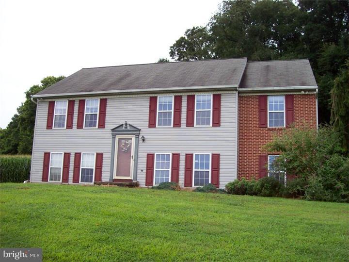 Private 15+acre farmette, fabulous views. 3 BR, 2 full baths, new flooring, paint, deck, countertop. Finished lower level attached 2 car garage, detached 4 car garage/shop, stream, some woods, fenced pasture.