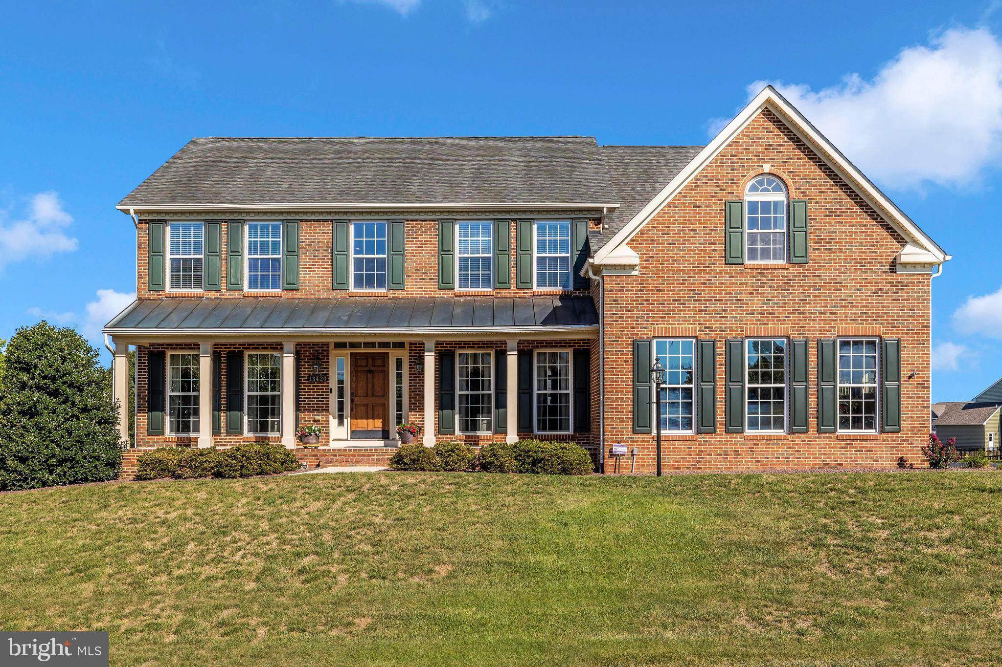 Welcome to this beautiful brick fronted colonial located in Elmwood Farm! Situated on a .53-acre lot, this Ryan Avalon model with three finished levels totals approximately 5,000 square feet of luxury! Enter the dramatic two-story foyer with its split staircase and look ahead to the formal living and dining rooms with gracious 3-piece crown and chair moldings. Relax in the expansive family room with gas fireplace. You will also find a study / office with crown molding and a first-floor powder room. Throughout the first floor you will find 9' ceilings and hardwood floors, with the exception of carpet in the FR, LR and study.
 The kitchen is a chef’s delight with its spacious walk-in pantry and generous cabinet space, granite counters, stainless steel appliances, large island, double wall oven and gas range! There is also a sunlit morning room that leads to an 8 x 10 trex deck with stairs to the patio!
The upper level features an opulent primary suite featuring cathedral and tray ceilings, a fabulous Palladian window over the luxurious soaking tub, separate shower, two spacious walk-in closets with access doors to convenient storage and two spacious vanities. You will also find three additional bedrooms, two of which share a Jack and Jill bathroom. The fourth bedroom has its own full bathroom.

 The lower level has lots of sunlight with large rear windows and a level walk-out with French doors to the rear yard. Also, a fabulous paver patio that’s over 700 square feet and a 20 x 10 shed! There is an abundance of space to relax with family and friends with a spacious recreation room with lots of recessed lighting, surround sound with 2 wall speakers and 2 ceiling speakers and a full bath. There is also a large utility room with lots of storage space that includes a 50-gallon hot water heater, added humidifier to furnace and passive radon remediation system. There is a breaker box in the utility room and one in the garage.
The two zone HVAC system was completely replaced in 2021.
This Avalon also comes complete with a two-car side load garage.
Do not miss this wonderfully sensational home!