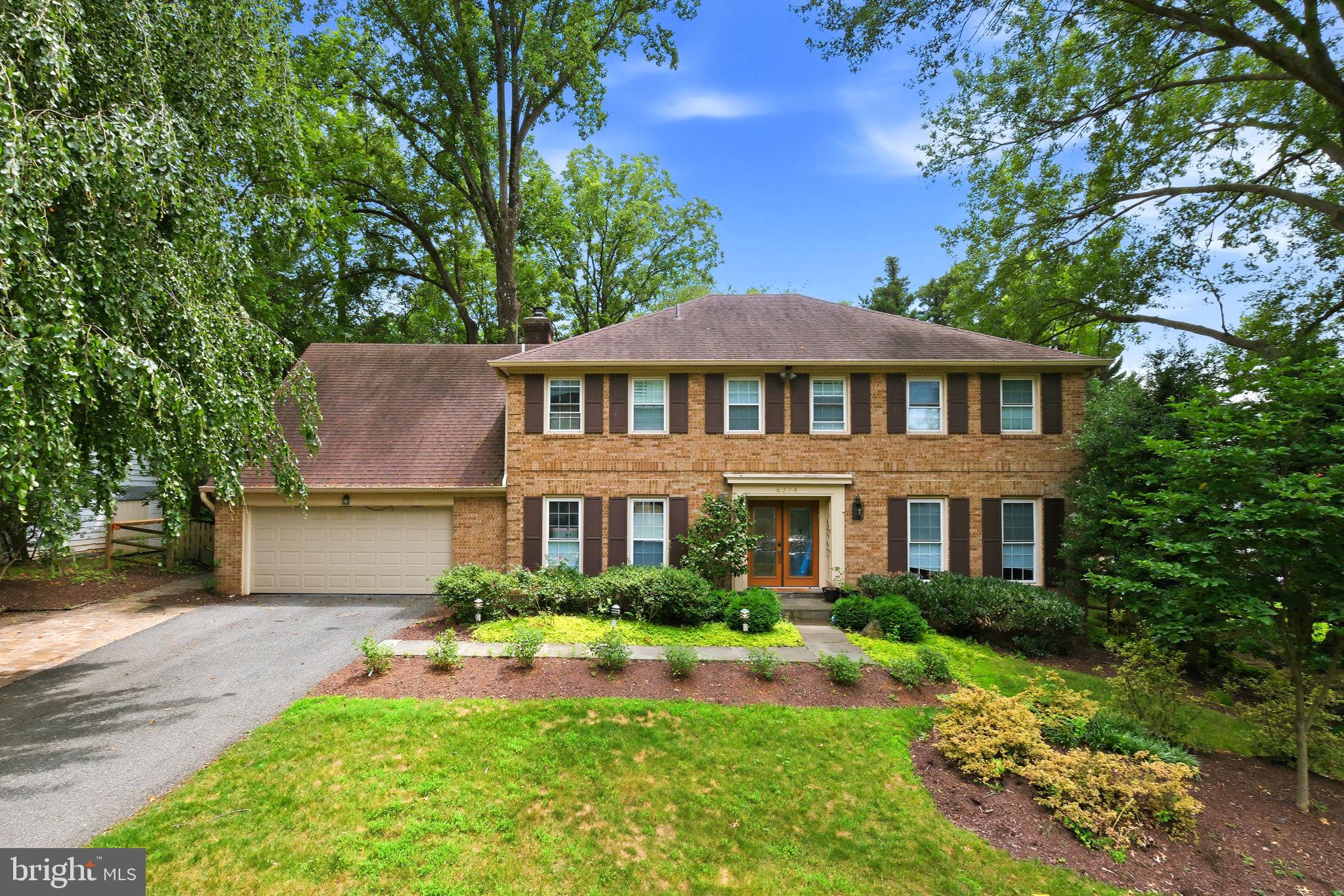 Welcome to 6224 Mazwood Road, an exceptional brick colonial perfectly situated on a premium half-acre lot along a quiet street in North Bethesda’s highly sought-after Windermere community. Impeccably maintained and recently renovated, this timeless property seamlessly blends classic craftsmanship with today’s modern comforts. Among the largest floor plans in this tree-lined neighborhood, it offers four spacious bedrooms, five and a half bathrooms, and nearly 4,000 square feet of refined living space across three finished levels.
From the moment you arrive, the impressive curb appeal is evident. Professionally landscaped grounds frame the property, while the expansive, private backyard creates a true outdoor retreat complete with a large entertaining patio and luxurious hot tub—the perfect place to relax and unwind. A recently updated two-zone HVAC system provides year-round comfort and peace of mind.
The open-concept main level creates an inviting setting for both everyday living and entertaining. Anchored by a wood-burning fireplace, the spacious living room opens directly to the backyard, creating a seamless connection between indoor and outdoor spaces. The adjoining breakfast area flows into a spectacular chef’s kitchen, completely renovated in 2022 and appointed with a dramatic ten-foot quartz island, premium stainless steel appliances, abundant custom cabinetry, and generous workspace. An elegant formal dining room provides an ideal setting for holiday celebrations, while a private office with custom built-ins offers a sophisticated work-from-home environment. A spacious mudroom and laundry area with direct access to the oversized two-car garage add everyday convenience.
Upstairs, the primary suite serves as a peaceful retreat, featuring a private sitting area, dual walk-in closets, and a beautifully renovated spa-inspired bathroom with sophisticated modern finishes. Three additional generously sized bedrooms are served by two full bathrooms, providing exceptional comfort and flexibility for family and guests alike.
The fully finished lower level expands the property’s versatility with an oversized recreation room ideal for movie nights, games, or entertaining, along with a full bathroom and abundant storage space.
Ideally located just moments from the Windermere neighborhood pool and tennis courts, this prime North Bethesda location offers access to top-rated schools and convenient connections to I-270, I-495, Grosvenor Metro, Strathmore Music Center, Pike & Rose, Montgomery Mall, and the shops, dining, and entertainment of downtown Bethesda. Combining a sought-after location, generous living spaces, and thoughtful updates, this remarkable property presents an extraordinary opportunity to enjoy one of North Bethesda’s most desirable neighborhoods.