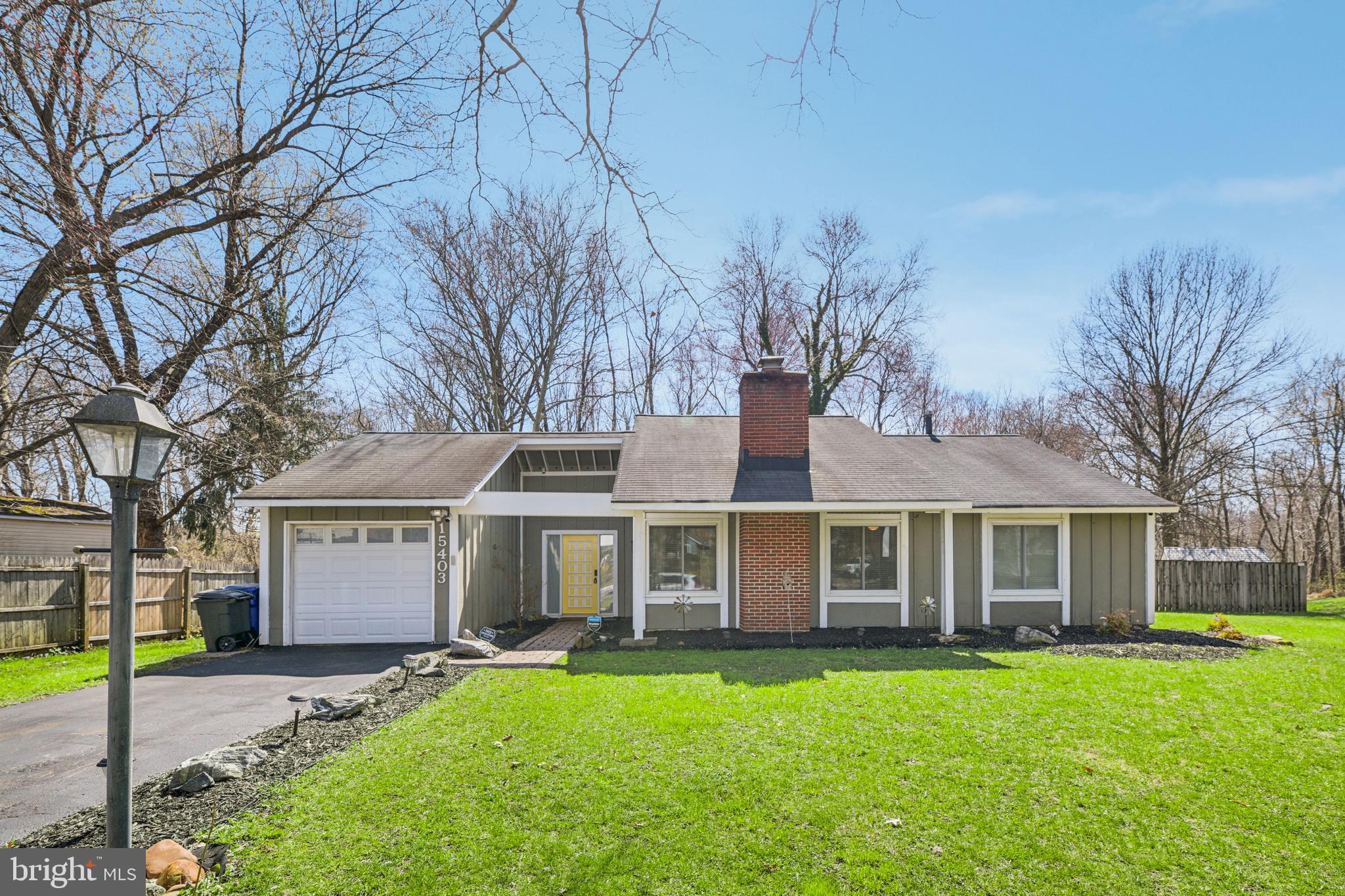 Welcome to 15403 Pegg Ct, a welcoming home featuring convenient one-level living with mid-century modern style. Featuring a partially fenced 0.38-acre lot on a tranquil cul-de-sac, this home has abundant natural light and a flexible open floor plan. The living area has a dramatic stone fireplace, vaulted beams, and scenic backyard views. The kitchen includes ample storage space with two pantries and walks right out to the patio which is perfect for entertaining, grilling, or just enjoying the serene wooded view. The tub, tile and toilets have been updated in the bathroom. Excellent location convenient to Bowie Town Center with multiple grocery, dining and shopping options and Annapolis and easy commuting to DC. Dog lovers will enjoy being just 1.5 miles away from Bowie Dog Park. Schedule a showing today!