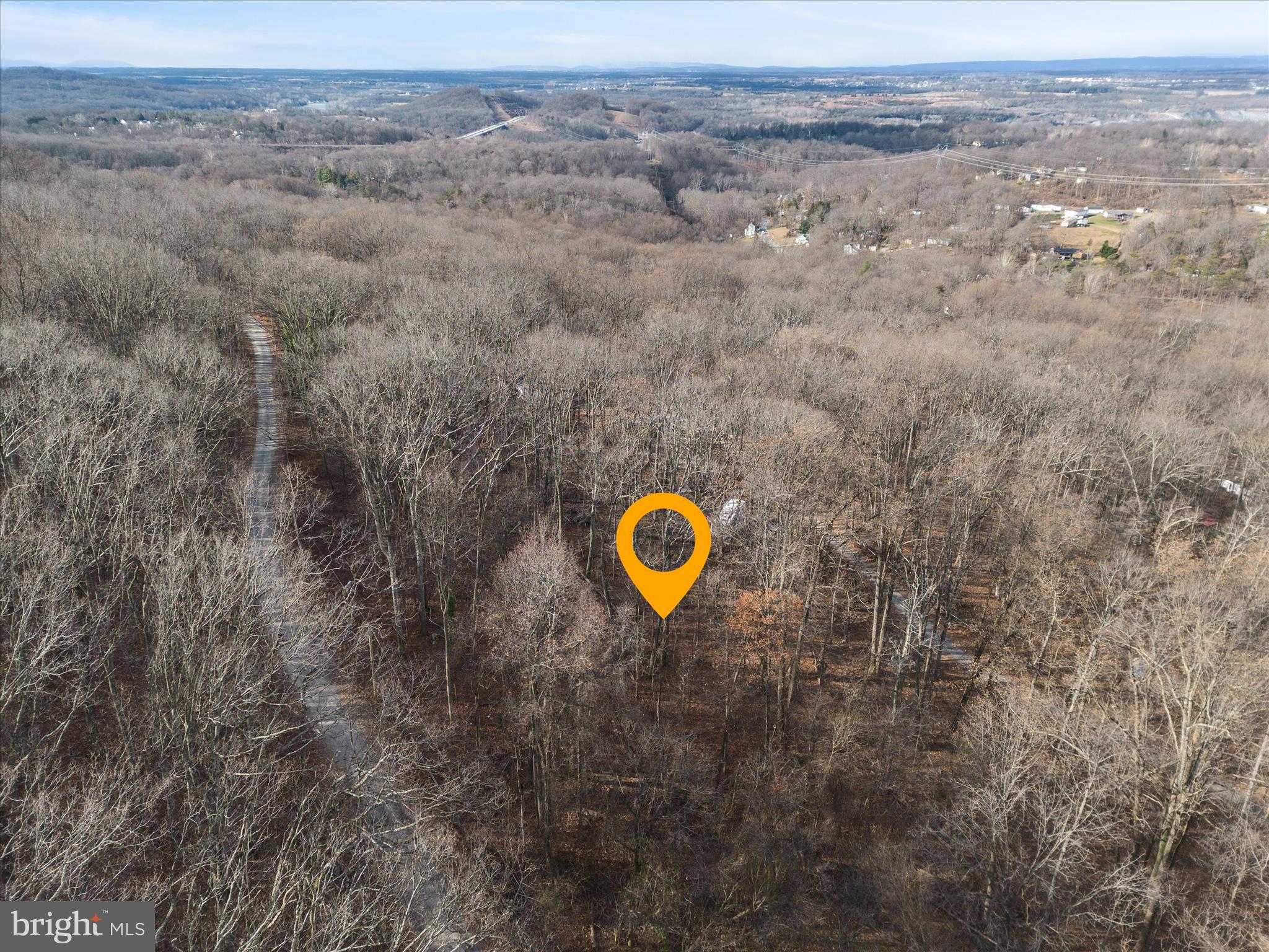 Three land lots totaling approximately 0.36 acres, westerly facing, with seasonal views of the Shenandoah Valley. These lots are within walking distance to the Appalachian Trail and a private fishing pond. Electric, public water utility, and Comcast Xfinity hookups are all available. Road frontage on both Red Maple Ln and Woodpecker Ln.  Being sold "As Is".