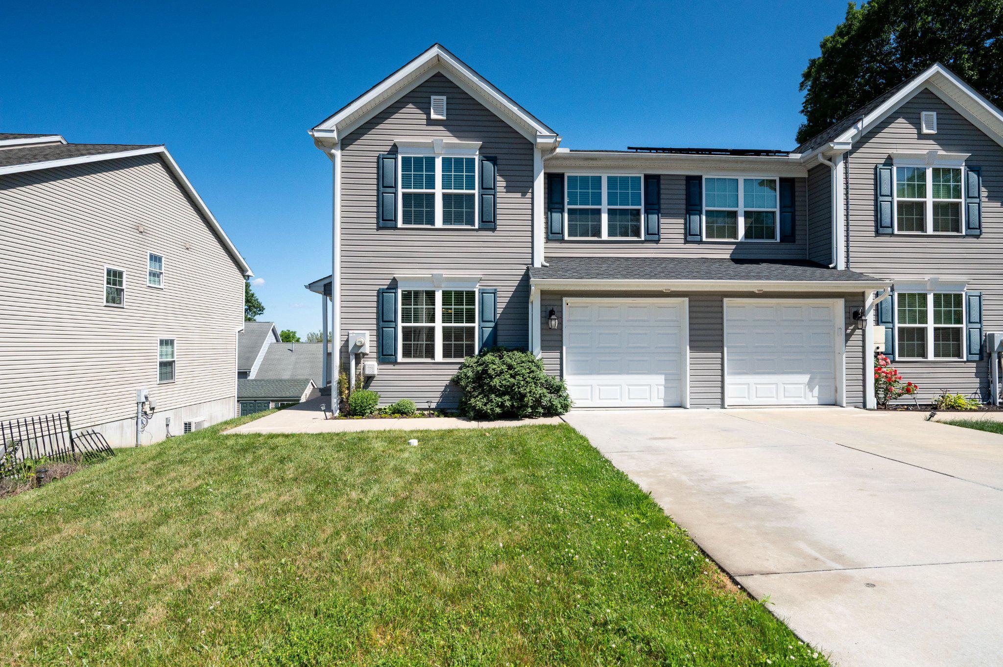 Welcome to 25 Rosalies Way—an inviting, move-in ready semi-detached home tucked away on a quiet cul-de-sac in Muhlenberg Township.

From the moment you step inside, you’ll notice the fresh, modern feel with new wood laminate flooring flowing throughout the main level and a bright living room accented by recessed lighting. The kitchen delivers both style and function with white cabinetry, stainless steel appliances, and a classic subway tile backsplash. Just off the kitchen, a flexible bonus space works perfectly as a breakfast nook or cozy family room, plus a separate dining room for entertaining.

Upstairs offers three bedrooms, including a spacious primary suite with a walk-in closet and private bath. Two additional bedrooms provide great space and storage, while the hall bath conveniently features second-floor laundry tucked behind folding doors.

The walk-out basement is ready for your vision—home gym, rec room, or additional living space. Out back, enjoy your deck—perfect for morning coffee or winding down in the evening.
Conveniently located close to local amenities, this home is ready for its next owner!
