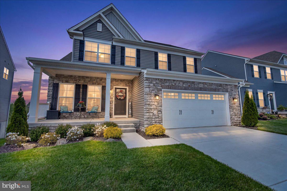 Located in Central Carroll County in the charming town of New Windsor, this nearly new home in the sought after Snader’s Summit community offers the perfect blend of space, style, and modern convenience. Built in 2022, this spacious residence features 5 bedrooms, a dedicated home office, and 3.5 bathrooms. The open concept main level showcases a beautifully upgraded gourmet kitchen designed for both everyday living and entertaining. Just off the garage, a thoughtfully added mudroom with built-ins provides functional organization. The main level also includes a private office and a convenient half bath.
Upstairs, you’ll find four generously sized bedrooms, two full bathrooms, and a centrally located laundry room for added ease. The fully finished lower level expands your living space with a large recreation room, an additional bedroom, and a full bath perfect for guests or multi-generational living. A walk out slider and full size windows fill the basement with natural light and lead to a concrete patio. Additional storage space is smartly tucked under the stairs.
Enjoy outdoor living on the rear deck, where you can take in the stunning sunsets that Carroll County is known for. This move in ready home combines modern upgrades, flexible living space, and a prime location, an opportunity not to be missed. Welcome Home.