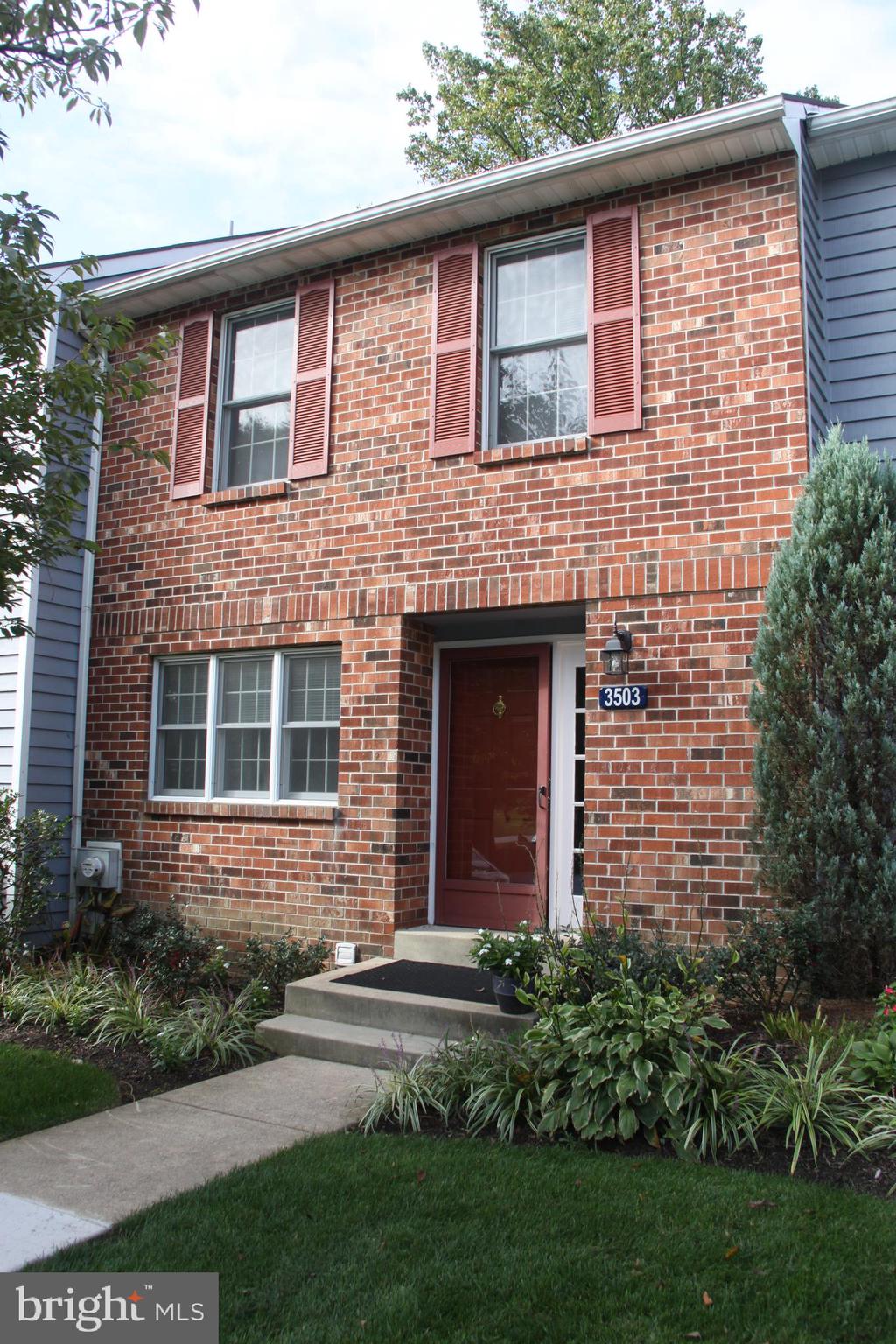 Beautifully  maintained and updated townhome with finished walk-out lower level family room.  Living/dining room combination includes wood burning fireplace and deck access.  Large eat-in kitchen with new hardwood, great counter space and pass through to great room.  Second floor offers a master bedroom with private bath, 2nd bedroom with 2 closets, hall bath, and a large hall closet for storage.  Spacious finished walk-out basement with built-in entertainment center.  Large laundry/storage room includes newer washer and dryer, and terrific built-in work surface for crafts or hobbies.  Popular neighborhood!  Private lot backing to woods.  Located behind Glen Eagle Shopping Center with Whole Foods, Harvest, and other great restaurants and shops.  Rent includes lawn care, snow, trash and exterior maintenance.  NO SMOKERS OR PETS.  First and last months rent plus $2500 security deposit due at lease signing.