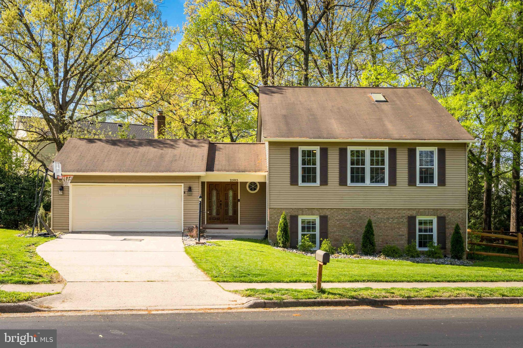 Offer deadline Monday, April 27th @ 12 pm. Welcome to this spacious and stylish 4-bedroom, 3-bathroom single-family home located on a prime corner lot in the highly desirable Fox Mill neighborhood. From the moment you step inside, you'll be impressed by the refinished oak hardwood floors that flow throughout the main living areas, creating a warm and cohesive feel. At the heart of the home is an open-concept kitchen designed with both functionality and style in mind—featuring a large center island with seating, sleek quartz countertops, custom tile backsplash, stainless steel appliances, and ample cabinetry. It’s the perfect space for gathering and entertaining. The upper level also offers an expansive owner’s suite with its own en-suite bathroom, two large guest rooms and an updated hall bathroom. The lower level boasts a massive guest bedroom, a third full bathroom, and a generous rec room—ideal for movie nights, game days, or a home office setup. Recent upgrades include a brand new HVAC system (2024), newer windows (2017), and fresh interior paint (2021). Located within a welcoming community known for its mature trees, top-rated schools, and easy access to shopping, dining, and commuter routes—this home truly has it all.