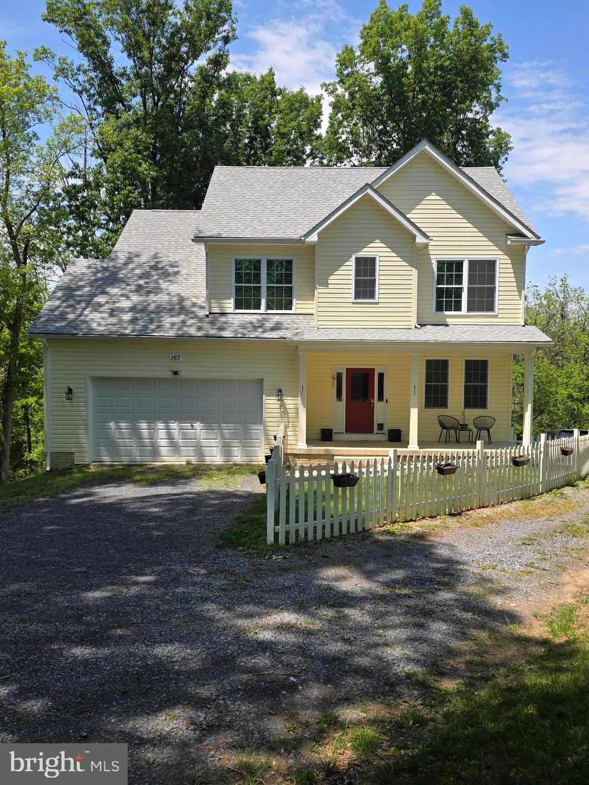 RIVER ACCESS * BEAUTIFUL PRIVATE * 2.52 ACRE * CUL-de-SAC *  3477  Finished Sq Ft *  2 Car Garage * Home located in the Exclusive Avon Bend Community of Charles Town WV.  Quality Counts! -  Built in 2022-  NOTE: THIS HOME COMES COMPLETE WITH 2 FULLY FINISHED KITCHENS & LAUNDRY AREAS !!!!   LOWER LEVEL PERFECT AS A PROVEN INCOME PRODUCING RENTAL/AIR BnB/IN-LAW SUITE !  Modern Open Floor Plan boasts of 3 finished levels * Total of 4 Bdr/ 3.5 Ba.  A Hard to find Main Level Primary Suite /Tray Ceiling/ en-suite luxury Full Bath/ Walk-In Closet/ Linen Closet * Living Rm w/ Granite Surround easy care smokeless ventless propane Fireplace/ Tree Top Views * Dining Area w/ Deck Access * Gourmet Kitchen w/ Upgraded Granite Counter tops/ White Cabinetry/ Large Center Breakfast Island w/ Ceramic Double Farm Sink/ Corner Pantry / Recessed Lighting * Main Level OFFICE w/ Double French Glass Doors * Convenient Half Bath & Coat Closet off Foyer * Main level Laundry & Mud Rm from 2 Car spacious Garage. *  UPPER LEVEL-  2 restful Guest Bdrms (w/ Walk In Closets) share a Large Jack & Jill Bath w/ double sink granite top white vanity/ Sep locking Water & Shower Closet.  IMPRESSIVE WALK OUT LOWER LEVEL- Completely Separate if desired or connected through main living space-- SECOND FULL KITCHEN ( matching upper level design )  SECOND Full Laundry * 2nd Family Rm / Dining table space * 4th Bdr w/ attached Full Bath/ Granite top Double sink White Vanity/ Tub/Shower/ Unfinished Storage Area/ Exterior Patio.  OTHER enticing upgrades: Matching Luxury Vinyl Plank Flooring ALL levels;  Over-sized Windows; 7 Ceiling Fans; Recessed Lighting, Matching Granite: 9'  Ceilings on main & lower levels;  2" faux Wood Blinds throughout; Keyless programable entries; Wireless Blink Alarm System; Fenced Yard; Outdoor Custom built FIRE PIT;  Work from home??  XFINITY HIGH SPEED INTERNET has you covered  (Underground Electric & Internet Utility lines. )
AVON BEND HOMEOWNERS ASSOC -affordable $30/YEAR HOA- Includes Private (locked) Gated SHENANDOAH RIVER & BEACH ACCESS; Open GRASS PARK AREA/Tot Lot/Covered Pavilion/Basketball Court. Driving Directions to Park and River Beach in Docs Section.  River access Restricted to Avon Bend Homeowners only. 
PERFECTLY Designed for quiet living while enjoying the bounties of surrounding natural habitats. Truely a hidden gem!  Historic Charles Town and Shopping & Entertainment conveniences just minutes away !