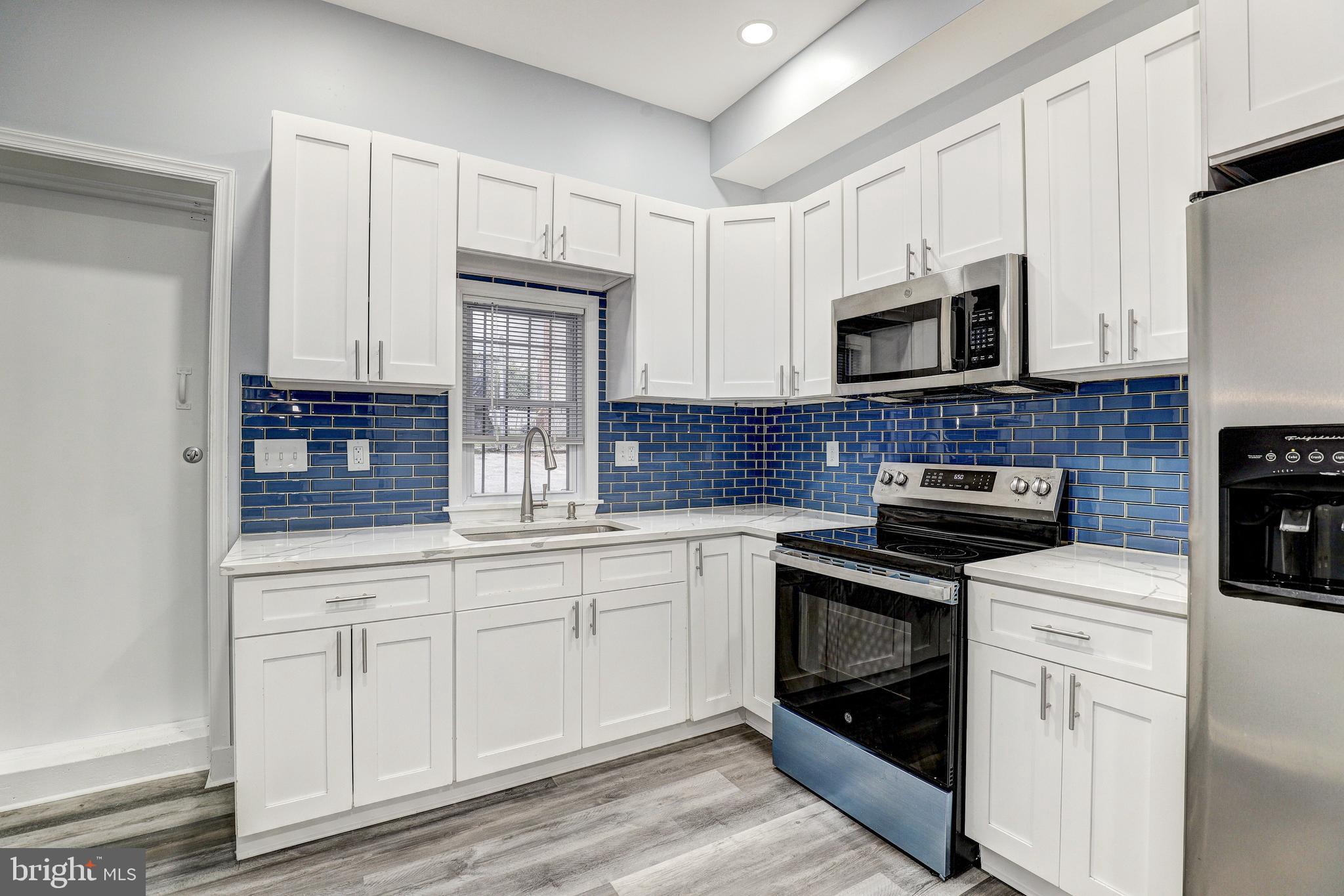 Welcome to 1602 Abbotston Street — a unique one bedroom, one and a half bathroom home offering a flexible layout and modern updates in Baltimore City. Fresh paint, recessed lighting, and LVP flooring create a clean and updated feel throughout the main level. The gourmet kitchen features stainless steel appliances, modern backsplash, ample cabinet space, and access to the rear deck — perfect for relaxing outdoors or entertaining guests. A convenient half bathroom is also located on the main level.

Upstairs, you’ll find a generously sized bedroom with great natural light and a full bathroom. The fenced rear yard offers additional outdoor space and privacy, plus ample parking alongside and behind the home — a rare convenience in the city. Conveniently located near Clifton Park, Harford Road, and I-83 with easy access to local shops, restaurants, and commuter routes. A great option for an owner occupant or investment property!