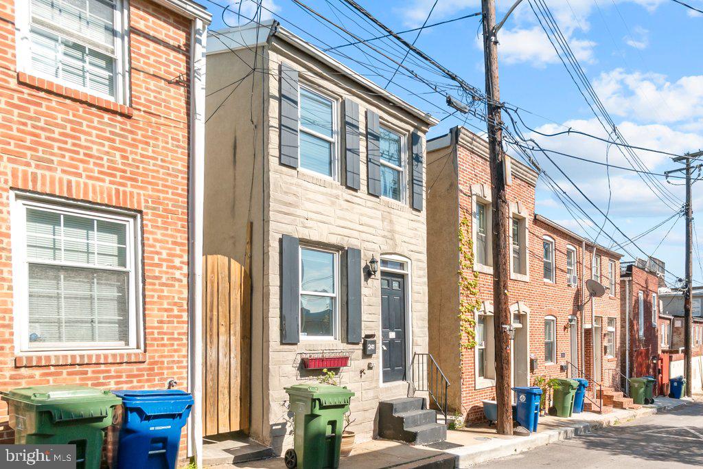 Welcome to this rare find in Upper Fells Point, a move-in ready, fully detached home that offers the best of city living without the typical rowhome noise. Unlike most properties in the area, this two-bedroom, one-bath home shares no party walls, giving you added privacy and peace while still being in the heart of it all. Inside, you’ll find spacious bedrooms, a comfortable family room, and a large, functional kitchen complete with stacked laundry for everyday convenience. Upstairs, a skylight fills the bathroom and hallway with natural light, creating a bright and airy feel that sets this home apart. The entire home has been freshly painted from top to bottom, making it truly move-in ready for its next owner. Ideally located just minutes from Johns Hopkins Hospital, Canton, and the vibrant shops, restaurants, and waterfront of Fells Point, this home offers both convenience and charm in one unique package. It's a rare opportunity to own a detached home in one of Baltimore’s most sought-after neighborhoods you don’t miss it.