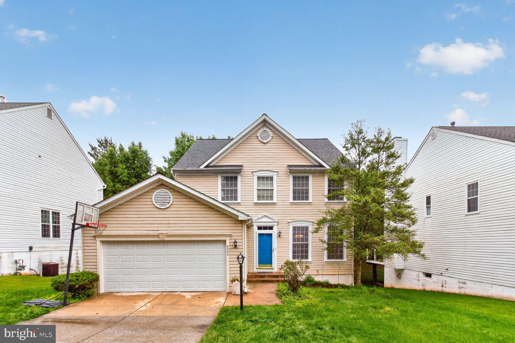 This charming colonial-style residence, nestled in the Village of River Hill, offers 4 bedrooms, 3.5 baths sited on a private lot backing to woods. Step inside to discover a warm and inviting atmosphere which thoughtfully designed floor plan flows effortlessly from the foyer into the living and dinning room, then continues into kitchen & family room. Accentuated by wood floors that flow seamlessly through the main living area.The spacious family room featuring four large windows w/back yard view.The kitchen opens to family room that is well-appointed with 42" oak cabinetry, granite countertop, stainless steel appliances replaced in (2019), including a self-cleaning oven, a refrigerator with an ice maker, and dishwasher.The specious breakfast area is bathed in natural light, casual dining, w/a slid door leading to a deck overlooking the private treed back yard. Upstairs are 3 bedrooms, 2 full baths, new carpet (2026), master suite w/two walk-in closet, a cathedral ceiling w/fan, and boasts a super bath w/separated walk-in shower & tub. Additional highlights include a convenience upper level laundry. The walkout lower level includes a fourth bedroom, full bath, a specious Rec. Room with a slider leading to a new patio (2026), new carpet & paint (2026). Also, new garage foxy coating floor (2026), newer garage door (2025), roof (2021) and A/C (2020).