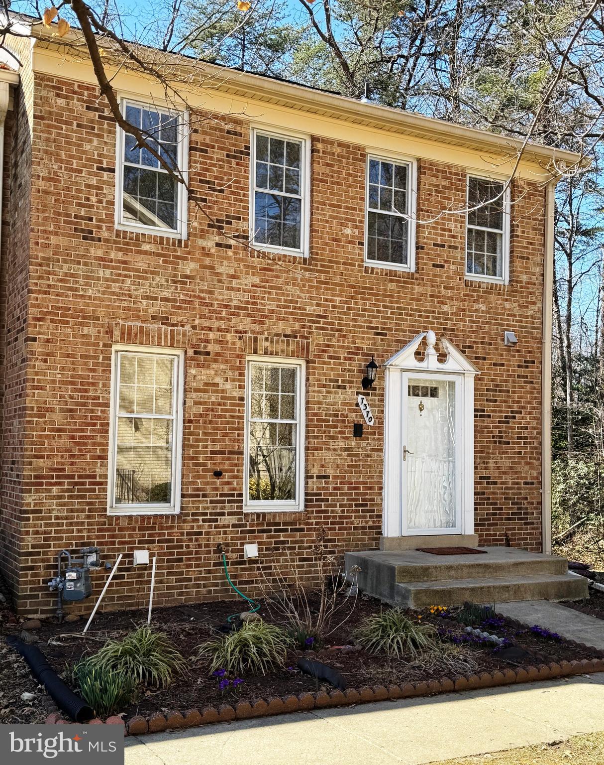 Large and lovely end unit townhome with spacious backyard minutes to the Parkway and Burke Lake. Open concept on the main level with spacious living room and dining room with gleaming hardwoods plus a den or office for working at home or a  private reading room.   Many updates including granite counters in the kitchen,  Upper level with primary ensuite, 2 additional bedrooms & 2nd full bath  .Wood laminate flooring upstairs !  Lower level  with a Hugh rec room room  with fireplace  walking  out to the private backyard & half bath as well.  What a great place to play with the entire family or guests.   Deck off main level to enjoy nature at its finest.  Freshly painted throughout and new carpeting!  Location can't be beat... Easy access to the metro, I395..Ft. Belvoir, NGA, Costco & enjoy playing in Lake Mercer Park with it Rec Center, nature trails and dog park....A Perfect Place to call Home!  Don't delay!