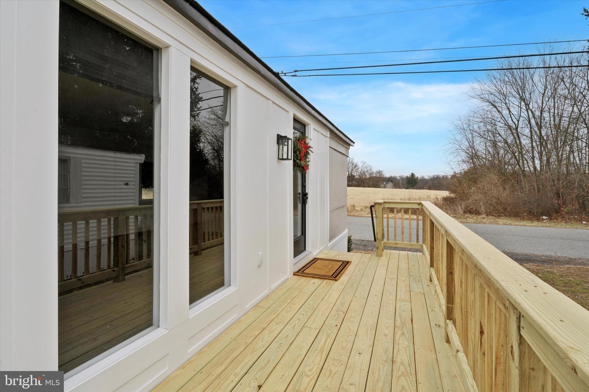 Fully renovated and move-in ready 2-bedroom, 1-bath home in Spring City! This beautifully updated home offers a bright open-concept layout with brand-new flooring, recessed lighting, and a modern shiplap accent wall with an electric fireplace. The upgraded kitchen features new cabinetry, stainless steel appliances, and a stylish tile backsplash. The full bath has also been completely renovated with contemporary finishes. Enjoy two comfortable bedrooms, fresh paint throughout, and great natural light.
Outside, the home features a brand-new deck, refreshed exterior, updated landscaping, and private parking. Located in a well-maintained community with $870/month lot rent. A perfect blend of comfort, modern style, and affordability.  Nothing to do but move in! Schedule your showing today!