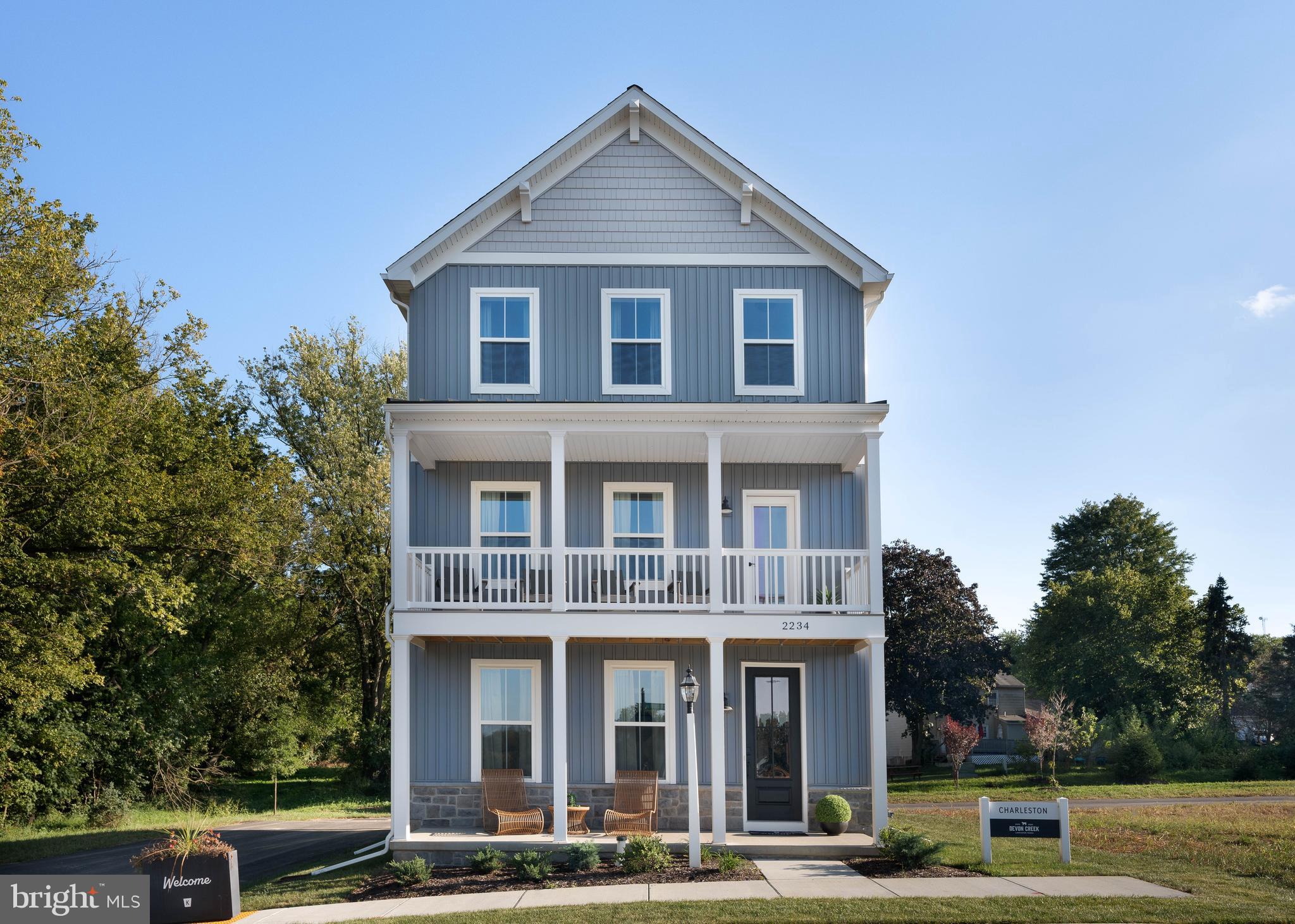 Step inside the Charleston Farmhouse, a 3-story Terrace floorplan exclusively offered at our community of Devon Creek! 

Inside the Foyer is direct access to the rear-load 2-car garage, stairs to the second floor to your right, and a flex space to your left that is staged as a Home Office. The office features floor-to-ceiling vertical trim and a 60x20 transom window for privacy yet added detail. We accented the stairway with a painted brick veneer accent wall leading up to the main level of the home. 

Upstairs is the heart of the home with an open layout featuring the Classic Kitchen, Family Room, and Dining Area. Off the Kitchen is a Laundry Room which features an extra storage closet and is enclosed by a sliding barn door. The main level also features a front and rear deck perfect for cooking outdoors or enjoying the views of the community. The Classic Kitchen features our sage cabinets, three light pendants above the island, and a white tile backsplash. The countertop extends to a serving nook with glass front cabinets right behind the Dining Space. The Family Room features a gas fireplace, built-in shelving with wall sconces, and a brick veneer accent. 

Head upstairs to find the Owner's Suite with full bath , 2 additional Bedrooms, and a Family Bathroom. The Owner's Suite features three 20x20 windows, horizontal trim detail, and a spacious walk-in closet. The Owner's Bath features upgraded options including a double vanity, floor-to-ceiling tiled shower, and white hexagon tile flooring. Bedroom 2 features a box-trim accent wall and double-door closet. Bedroom 3 features a 60x20 transom window and double-door closet. 

Discover the ultimate in high-end living at Devon Creek, a new community of custom homes in Lancaster, PA. Immerse yourself in a warm and inviting neighborhood that offers front porch living, tree-lined streets, and a variety of stunning home styles. At Devon Creek, you'll enjoy an array of resort-style amenities and outdoor spaces that provide a perfect setting for relaxation, recreation, and socializing with friends and neighbors. Whether you're in the mood for a swim in the community pool, a workout in the fitness center, or just a relaxing chat with your neighbors, you'll find it all here. The community is home to a state-of-the-art clubhouse, which features a Café + Entry Hall, Great Room, Fitness Center, Restrooms, and the Pool + Pavilion.  The clubhouse is the center of community life, a place where residents can come together for activities, events, and to enjoy the company of friends and neighbors. The community will also feature pocket parks and green space for all homeowners to enjoy! Devon Creek Terraces offers 1 customizable floorplan with over 10,000 structural and decorative customizations. Looking for more customization? Additional changes are available through our Design Time option. Your Designer will be with you every step of the way to help bring your vision to life. Our quality homes are backed with an industry-leading 20-year warranty structural warranty. Learn more about how Keystone Custom Homes are 80% more efficient than used homes and 50% more efficient than other new homes.