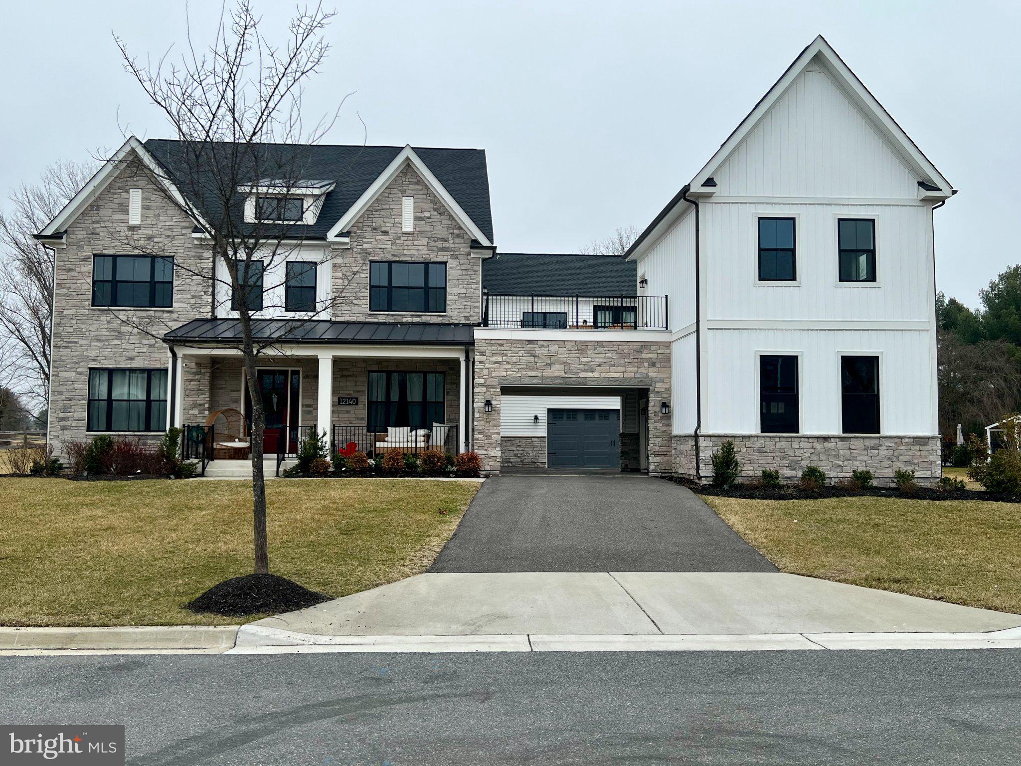 Welcome to an exceptional expression of modern luxury at 12140 Hanson Farm Drive, a Toll Brothers Palatine Modern Farmhouse set within the prestigious Mt. Prospect – Windmill Collection in North Potomac.
As the largest model in this master-planned community, this residence has been thoughtfully designed and extensively upgraded to deliver a seamless blend of architectural elegance, advanced technology, and refined everyday living.
A grand two-story foyer introduces a series of beautifully proportioned living spaces, where natural light, soaring ceilings, and curated finishes create an immediate sense of scale and sophistication. Designed for both intimate living and grand entertaining, the home offers a seamless flow between formal and casual spaces.
At the heart of the home, a chef-inspired kitchen serves as a true architectural centerpiece, featuring a stunning waterfall island with luxurious countertops, premium appliances, custom cabinetry, a dedicated prep kitchen, and a butler’s pantry. This elegant space opens effortlessly into the expansive great room and extends outdoors through a dramatic 15-foot multi-panel stacking glass door, creating a seamless indoor-outdoor living experience.
The residence offers six generously sized bedroom suites, each with its own private bath, along with two powder rooms, providing exceptional comfort and privacy for both residents and guests.
The primary suite is a private retreat, complete with a sitting area, dual walk-in closets, and a spa-inspired bath featuring high-end finishes and designer fixtures. A rare highlight is the private terrace off the primary suite, offering a quiet and elevated outdoor escape.
Designed with lifestyle in mind, the fully finished lower level includes a private bedroom suite, full bath, additional powder room, and a dedicated home theater with immersive surround sound, along with flexible recreation space ideal for entertaining.
A standout feature of this home is the private secondary suite/apartment, complete with its own entrance and terrace—perfect for extended family, guests, or multi-generational living.
Technology and comfort are seamlessly integrated throughout the home with a whole-house audio system, featuring built-in speakers across living spaces, bedrooms, corridors, and even the primary suite and bath, creating a truly connected living experience.
Outdoor living is equally elevated, with a luxury outdoor living space. Fully finished lower level with bedroom, full bath, powder room, and a dedicated home
theater room pre-wired for surround sound.
Whole-home integrated audio system, with speakers installed throughout living areas,
bedrooms, corridors, and even the primary suite
Private secondary suite/apartment with separate entrance and its own terrace — ideal.
for guests, extended family, or rental flexibility.
Primary suite retreat featuring a sitting area, dual walk-in closets, spa-like bath, and private terrace access.
Additional rooftop and covered outdoor spaces, enhancing the lifestyle experience.
Dedicated home office / study for modern remote work needs. 
Wine room / wine storage for collectors and entertainers. Luxury outdoor living installation, perfect for gatherings and relaxation.
Premium Upgrades & Craftsmanship:
This home has been extensively upgraded with over $400K+ in enhancements, including:
Chef’s ultra kitchen appliance package
Custom cabinetry and high-end finishes throughout.
Hardwood flooring throughout.
Upgraded bathrooms with designer fixtures and rainhead shower.
Integrated smart home and audio infrastructure.
Enhanced lighting and architectural details.