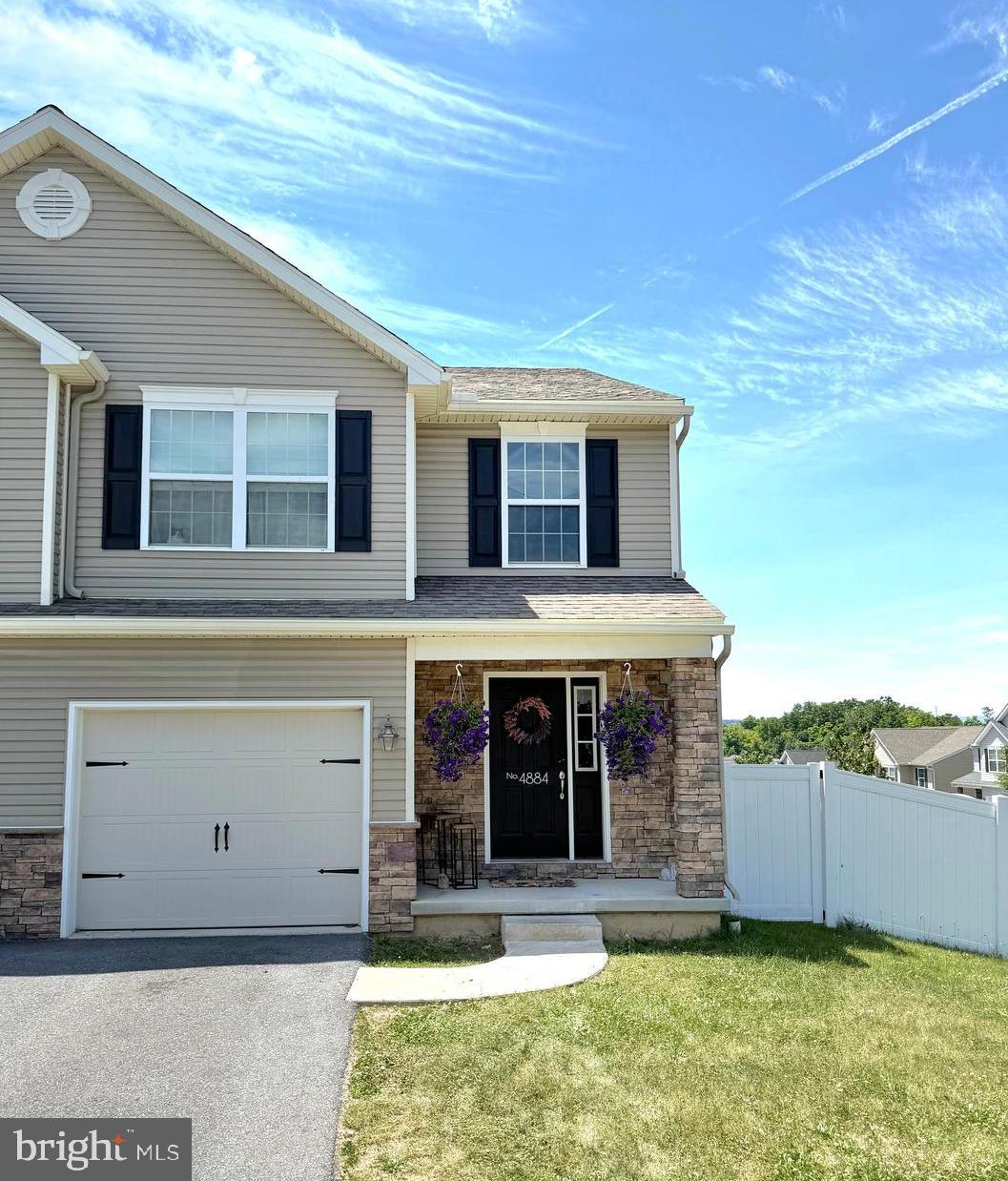 Join us for an Open House on June 16th from 5:30 to 7 p.m!

Nestled on a quiet corner at Fairmont and Mt Vernon, this 2019 semi‑detached home offers a polished blend of comfort and modern design. Thoughtfully maintained by its second owner, the property welcomes you with an airy, open main level that feels bright and effortless from the moment you step inside. The kitchen and living area flow together seamlessly, creating an inviting space for both everyday living and entertaining. A first‑floor half bath adds convenience, while the rear deck—enhanced with added stairs—provides easy access to the outdoor space.

The fully fenced yard with privacy fencing offers a serene setting for relaxing, hosting, or enjoying time outdoors. Upstairs, the primary suite features a walk‑in closet and private bath, complemented by two additional bedrooms and a second full bath.

The walkout lower level is a standout feature, offering high ceilings and full glass doors that open directly to the backyard. The space is ready for your vision, whether you imagine a stylish lounge, home gym, or additional living area.

Altogether, this home offers a well‑balanced blend of comfort and thoughtful design in a quiet corner‑lot setting. Schedule your showing—this one will not last long.