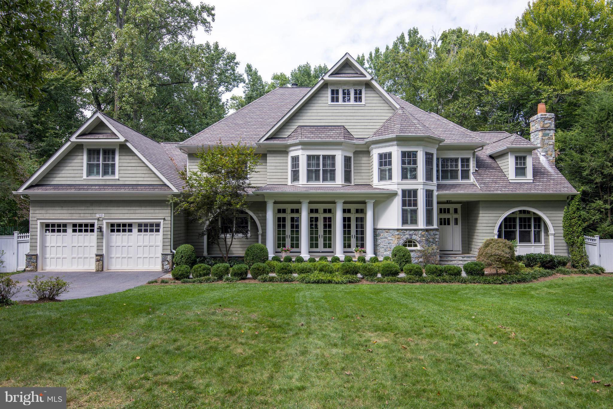 A storybook home w/every bell & whistle. Superbly constructed stone & shake Craftsman colo. aesthetically rich in design & detail- coffered ceilings, arched doorways, custom painted paneled walls, stone FPs. Comfortable, informal living spaces w/open flr plan, high ceilings, light & airy. Attractive, custom gourmet kitchen w/big center island for casual entertaining. Bus line accessible on Bradley