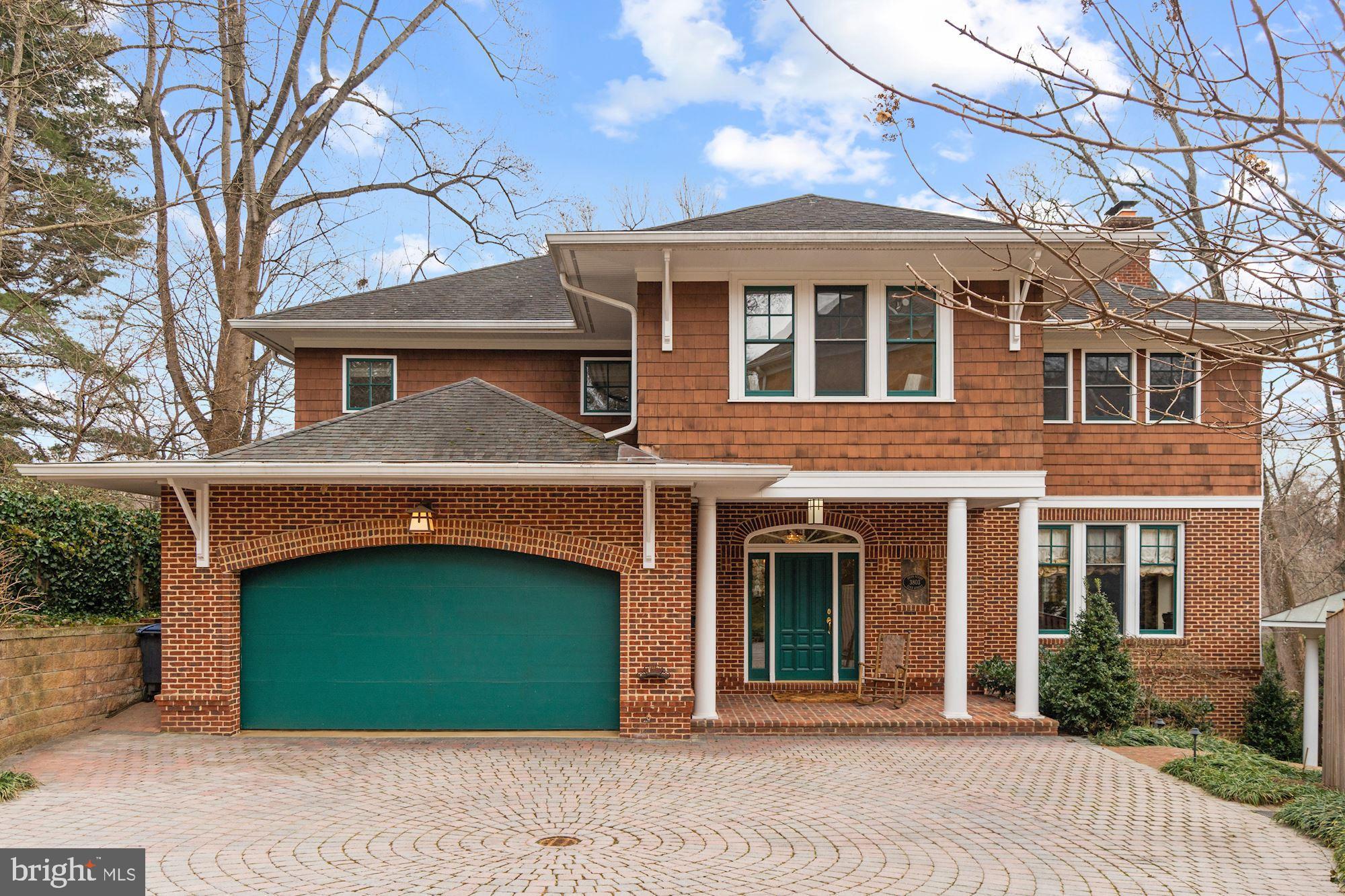 Just listed in Spring Valley! Nestled on a coveted cul-de-sac, this expansive, 6,000+ square foot home, on a very private .32 acre lot, has wonderful gardens and tree top views from almost every window! This property has fantastic scale, space, and flow. The first floor includes a grand entry foyer, formal living room with fireplace, dining room, study with wet bar, kitchen that opens to a spacious family room with fireplace, powder room, garage, and fabulous screened- in porch. Above, the Primary Bedroom Suite has two large closets including a walk-in, and an expansive bathroom with two vanities, tub, and separate shower. The same level has three additional bedrooms, two additional bathrooms, and a sizable laundry room. The walk-out lower level features high ceilings, a game room and a separate family room with a fireplace, both of which open directly to the back patio through full width glass doors.  In addition, the lower level has three large bedrooms and a full bathroom. Outside, enjoy a lovely patio, yard, and terraced gardens. Enjoy close proximity to all that Spring Valley has to offer including Millies, Compass Coffee, Pizza Paradiso, Wagshal’s, CVS, and so much more! Do not miss this fabulous Spring Valley home!