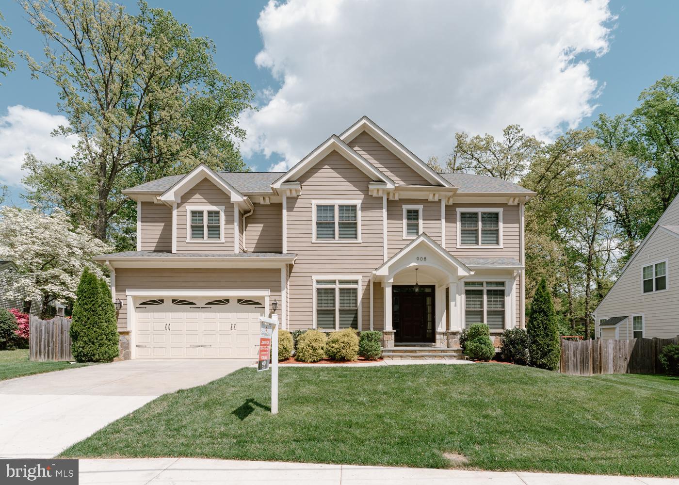 Perfectly situated in the highly sought-after Vienna Woods neighborhood, this stunning 5-bedroom, 7-bathroom home is a true gem, boasting 5,183 square feet of total living space (with over 3,990 square feet above ground). As you step through the front door, you are greeted by a luxurious foyer adorned with high-quality marble flooring, setting the tone for the elegance and sophistication that lies within. The foyer seamlessly flows into the family room, which is connected by a grand curved staircase leading to the second floor, showcasing high-quality and innovative design throughout. The expansive family room features a modern tray ceiling and a gas fireplace, creating a cozy atmosphere perfect for family gatherings. The room opens up to a Trex deck, providing the ideal space for outdoor entertaining. The gourmet kitchen is a chef's dream, equipped with top-of-the-line appliances, elegant French Country Kitchen cabinetry, and a generous center island. A large pantry room is conveniently located off the kitchen and connects to the two-car garage. The luxurious master bedroom suite is a sanctuary, boasting two oversized custom walk-in closets and a huge master bathroom with a shower and freestanding tub. Each of the additional bedrooms has its own private bathroom, providing ample space and privacy for family members and guests. The upper level also features a laundry room for added convenience. The finished lower level offers even more living space, with a recreation room and wet bar, as well as a gym, bedroom, and full bathroom. Step outside to the private fenced backyard, perfect for enjoying the outdoors in peace and privacy. Membership to the Vienna Woods Swim and Tennis Club is available, offering additional recreational opportunities. Located in the coveted Madison school pyramid, this home is conveniently located close to the Vienna Metro and bus stop, as well as downtown Vienna with its shops, restaurants, and parks. Easy access to I-66, Rt. 123, I-495, and Rt. 50 makes commuting a breeze. Don't miss this opportunity to own a truly exceptional home in one of Vienna's most desirable neighborhoods!