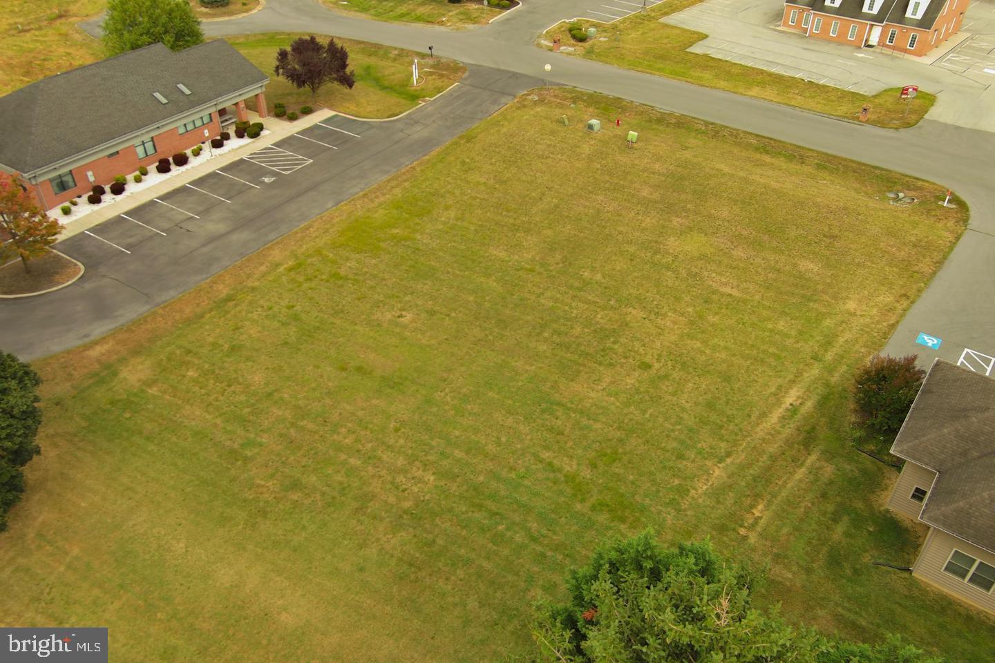 CARRERA MEDICAL COURT! Discover the perfect opportunity for your medical or professional practice with this .62-acre lot, pad finished and equipped with all utilities at the site. This property has a level terrain and a completed paved driveway and is ready for development. Ideally located near Berkeley Medical, various medical practices, and a one-day surgical facility, it offers unmatched convenience. Plus, it's just minutes from I-81, schools, and shopping centers. Don’t miss out on this prime location—call today for more information!