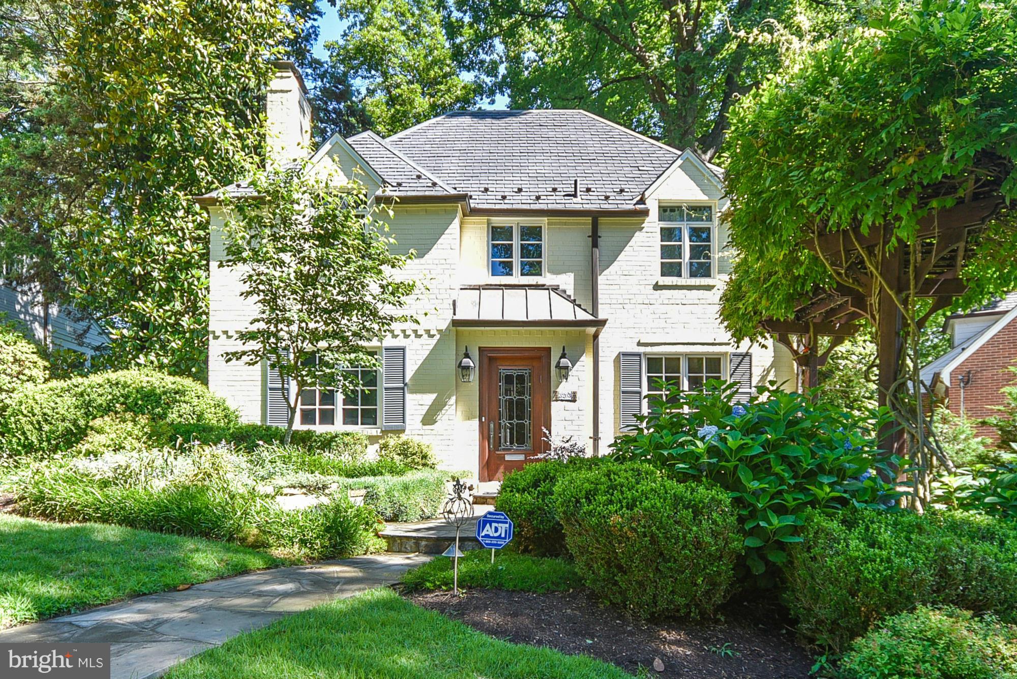 Huge price adjustment! Staged and looking like a model home! Great scale & space. Behind unassuming facade, 4 levels of perfection. SS Cook's kit w sep breakfast room. Family rm w stone fp. Huge DR, screen porch,  sumptuous MBR & BA. 3rd level hideaway (br #5). Delightful rec rm. beautiful landscaped private lot.