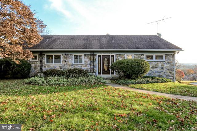 This original contemporary ranch home features open spaces, large stone fire places and beautiful scenic views of Lancaster county. The solid stone construction and unique lot on Blossom Hill make this property stand out. Large windows throughout the living areas face south-east giving you a dramatic view. Features also include a large 2 car garage and mature landscaping surrounding the property. The spacious, finished lower level could be complimented by adding a bedroom to go with the full bathroom. This is truly a unique property in a terrific location. Schedule your showing today!