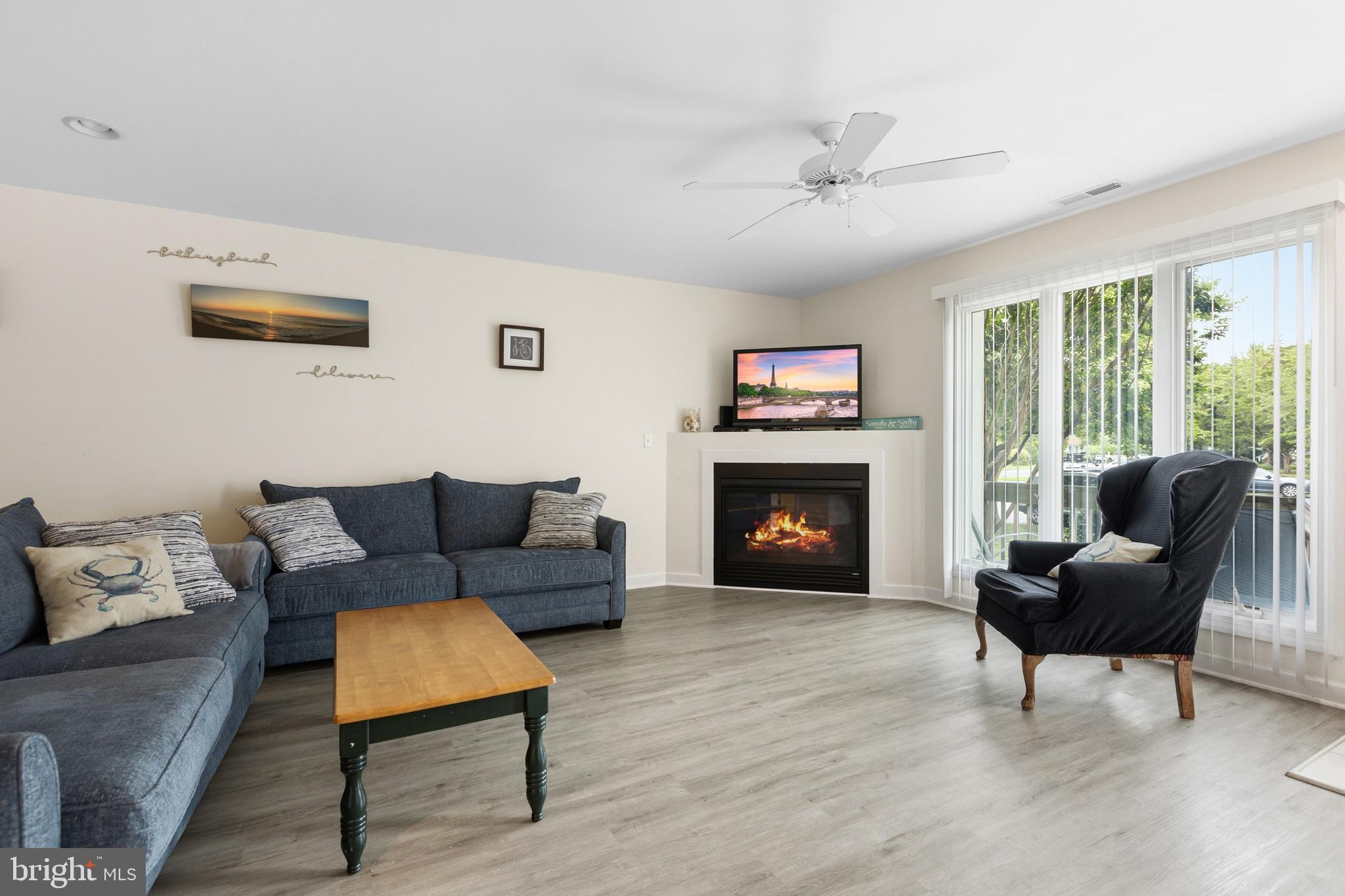 Beautiful move-in ready furnished Townhome less than a mile from the beach.  Walk, bike or shuttle to the Boardwalk, Town Center with boutique shops, and restaurants. Or relax at home and enjoy the community pool, or pickleball and tennis. On a cool night fire up the fireplace and enjoy a good book.  The home has new LVP flooring in the main areas, new carpet upstairs with recessed lights on the stairs for convenience.  Five year new HVAC/AC. Open kitchen with breakfast bar to the living room and fireplace.  A separate dining nook and an additional bonus room off the kitchen with back door access to the yard and the outside shower. Includes washer/dryer, 2 beach parking passes. Upstairs are 3 spacious bedrooms including a Primary Onsuite, walk-in closet, laundry room and full bath.  This is a well maintained home and feels loved. This community is close to the beach as well as just off the main road where you'll find lots to see and lots to do. 
 
Come see why so many of us love to live and vacation at the beach!!