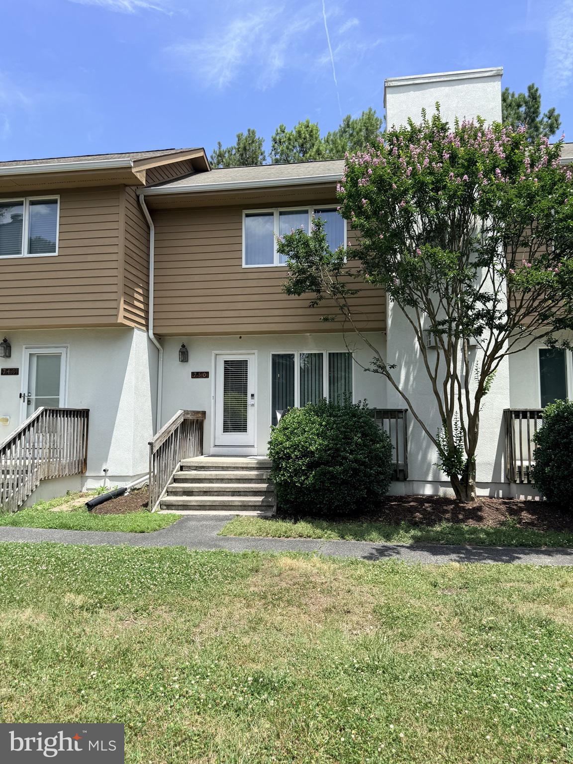 Beautiful move-in ready furnished Townhome less than a mile from the beach.  Walk, bike or shuttle to the Boardwalk, Town Center with boutique shops, and restaurants. Or relax at home and enjoy the community pool, or pickleball and tennis. On a cool night fire up the fireplace and enjoy a good book.  The home has new LVP flooring in the main areas, new carpet upstairs with recessed lights on the stairs for convenience.  Five year new HVAC/AC. Open kitchen with breakfast bar to the living room and fireplace.  A separate dining nook and an additional bonus room off the kitchen with back door access to the yard and the outside shower. Includes washer/dryer, 2 beach parking passes. Upstairs are 3 spacious bedrooms including a Primary Onsuite, walk-in closet, laundry room and full bath.  This is a well maintained home and feels loved. This community is close to the beach as well as just off the main road where you'll find lots to see and lots to do. 
 
Come see why so many of us love to live and vacation at the beach!!