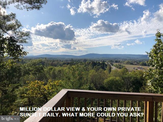 Your own private, daily sunset from wrap around deck, cul-de-sac location for peace and quiet. Come see this hideaway with gorgeous mountain views of Back Creek Valley. Downsizing? This cozy chalet is well maintained and low maintenance with upgrades to make living easy. Move in ready. Start your new adventure today. New roof, HVAC, deck and more. Pretty quartz countertops. Seller providing a 13 month HWA home warranty ($450 value). Appt. and pre-approval letter required.