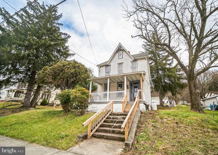 Built in 1900, this two story home offers approximately 1530 finished square feet, three bedrooms, one full and one half bath, hardwood covered front porch and partial basement. This home sits on an approximate 18082 sqft lot.  Property has UCC Statement for roof repair.