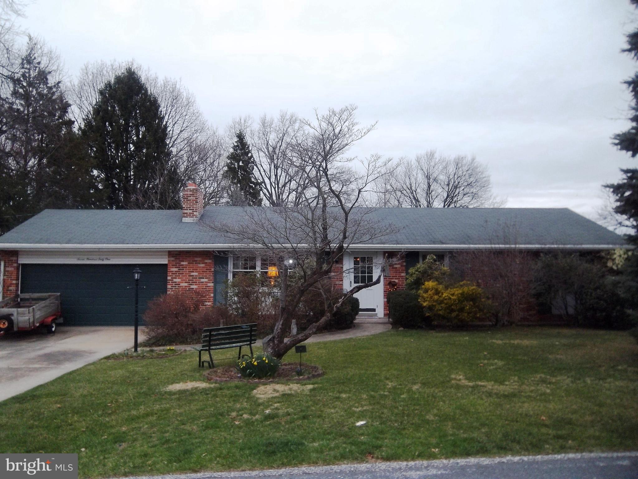 Spacious 4 bedroom brick rancher in desirable     York Suburban schools.  This home is                        conveniently located close to I-83, schools, shopping and restaurants.  The spacious Living Room features a wood burning fireplace and large picture window.  The 3 bedrooms on the main level              feature hardwood floors.  The 4th bedroom is in     the lower level along with a large Family Room       that opens up to the patio.  Bonus room in basement for office and also a workshop for the handyman.  Enjoy the outdoors sitting on the patio overlooking the fish pond.  Call Today For Your Private Showing!