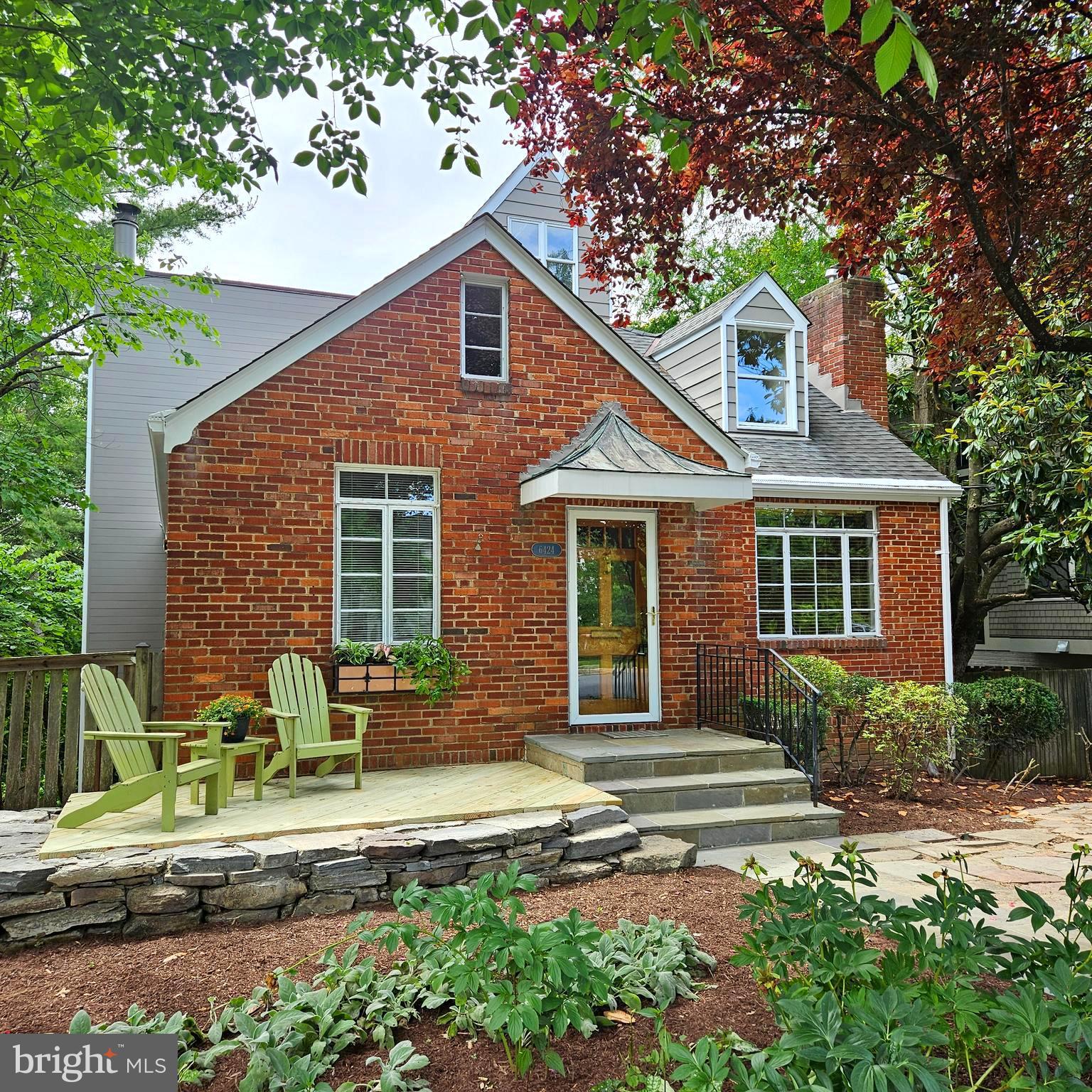 Nestled in the highly sought after enclave of Brookmont, in Bethesda, Maryland, this Cape Cod home with a contemporary addition, designed by the head of Architecture at the University of Maryland when added,  artfully blends casual and formal spaces, perfect for today's modern living and entertaining.  
From the moment you enter the vibrant Brookmont subdivision be prepared to be amazed and fall in love with the tree-lined streets, The Little Library, all-year-round farmers markets, and the sense of community! 
As you step into the home, you are greeted by an inviting main level offering a welcoming Foyer with built-ins, a spacious Living Room with stone fireplace, the Family Room with floor-to-ceiling windows, 2nd stone fireplace, and a tranquil, scenic view of trees and the pool!
The formal Dining Room with stone flooring, and floor-to-ceiling windows, also overlooks trees and pool.
The Gourmet Kitchen with stone countertops, offers stainless steel appliances, pantry and breakfast bar.  
Tucked in between the Family and Dining Rooms is a fabulous balcony, enclosed on three sides is perfect to enjoy morning coffee or the sunsets through the trees.
An Office or Bedroom with built-ins, Full ceramic Tub Bath and additional Bedroom complete this level. 
The upper private quarters boast a sun-filled Primary Bedroom with private balcony, two closets, and offers a private Primary Bath featuring dual sinks, glass-enclosed shower bath and linen closet. 
Completing this level are 2 additional Family-sized Bedrooms, stone shower Bath, and linen closet.  Don't miss the Sun Spot in the upper hall ceiling!
The lower level offers an au pair Suite with en suite Shower Bath, Playroom, or Den, [your choice] and walks-out to a spacious covered Patio, the pool and pool patio, perfect for an early morning swim or great pool parties! 
Also on this level is a laundry room with fold-down table for ease of laundry sorting and folding, along with a spacious storage area. 
The updates during the owner's time are the hardwood flooring, new carpeting, appliances, EV Outlet for your car, new front porch floor, fence, new glass doors to balcony in primary bedroom, recessed lighting in some rooms, and new Hardy Plank® siding on the addition!! 
This special home is located within minutes of DC, the C&O Canal, Capitol Crescent Trail, Sibley Hospital, Metro, Ride-On Bus, shops, restaurants, MacArthur Blvd, the Clara Barton Parkway and close proximity to DC.  See this very special home today!!!