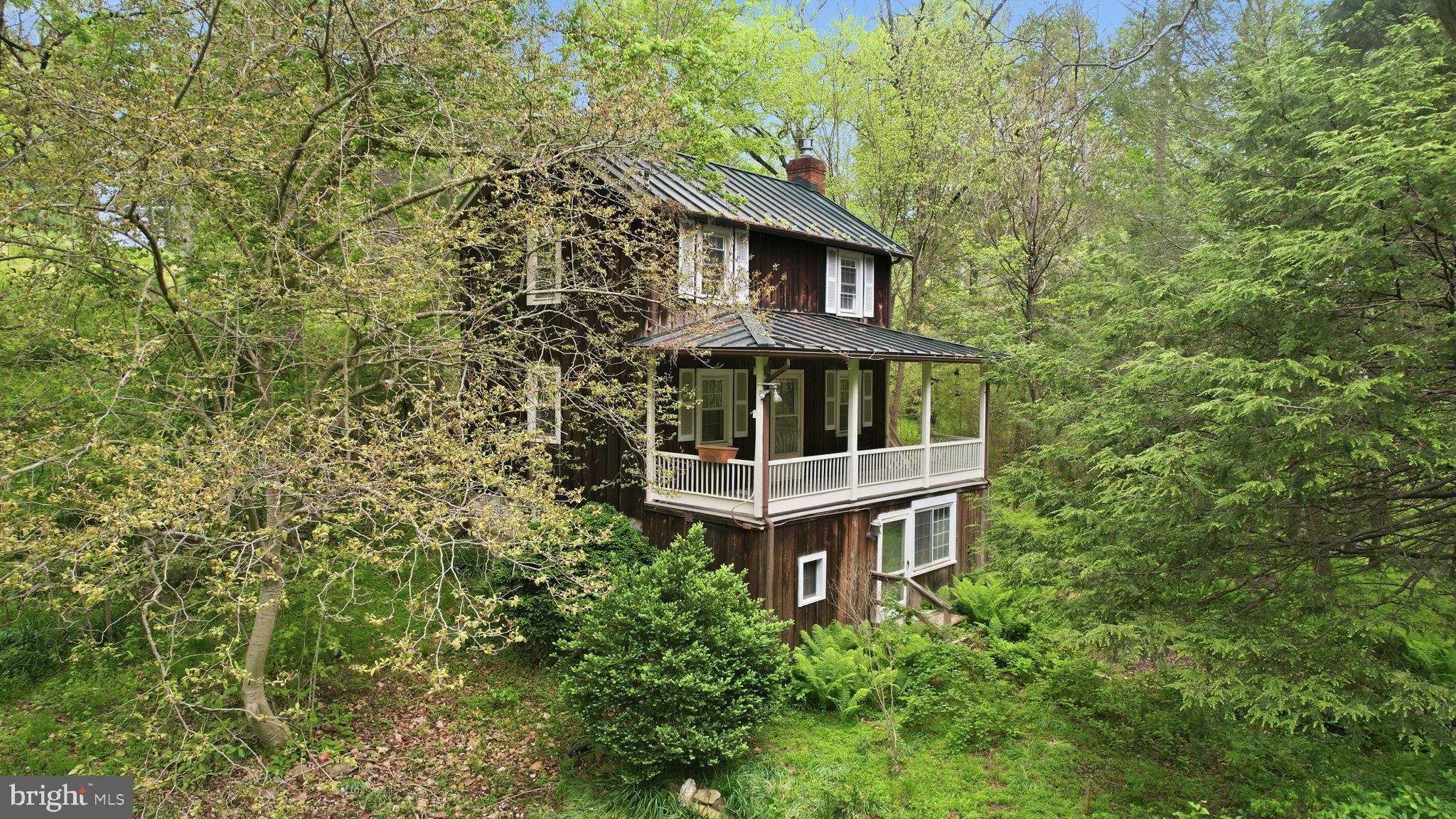 Investor special with endless potential! Tucked away on 5.75 private acres with streams and serene natural surroundings, this cabin is a rare opportunity to create a one-of-a-kind retreat.

The home has been fully demoed and is ready for a complete transformation. With the septic drain field recently replaced, key groundwork is already in place to bring your vision to life.

Whether you’re looking to build a high-demand short-term rental, a private getaway, or a custom residence, the setting and scale of this property make it a standout investment. 

The home is a fully blank canvas ready for you to bring to life!