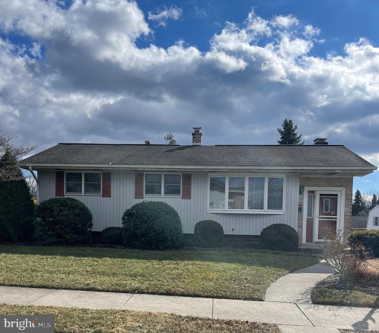 Don't miss the opportunity to live In-Town in Hershey! Walk to school, the Recreation Center, and in-town shops and restaurants. The kitchen has granite countertops, white cabinetry and the sink overlooks a nice size and flat backyard.  It opens into the dining and living room areas- great flow for entertaining. The primary bedroom is spacious enough for a king-size bed and has its own en-suite. Two additional good size bedrooms and another  full bath with a tub shower round out this level. The lower level has a large family room with  an abundance of natural light- a good spot to hang out or watch the big game. Working remotely? The home office has privacy and could accommodate two people working from home. A laundry room and a half bath round out the lower level. The attached one-car garage will save you from scraping ice and snow from your vehicle. Enjoy a barbecue on the covered back patio or play a game of catch in the spacious yard. Put your own stamp on this In-Town Hershey Home!