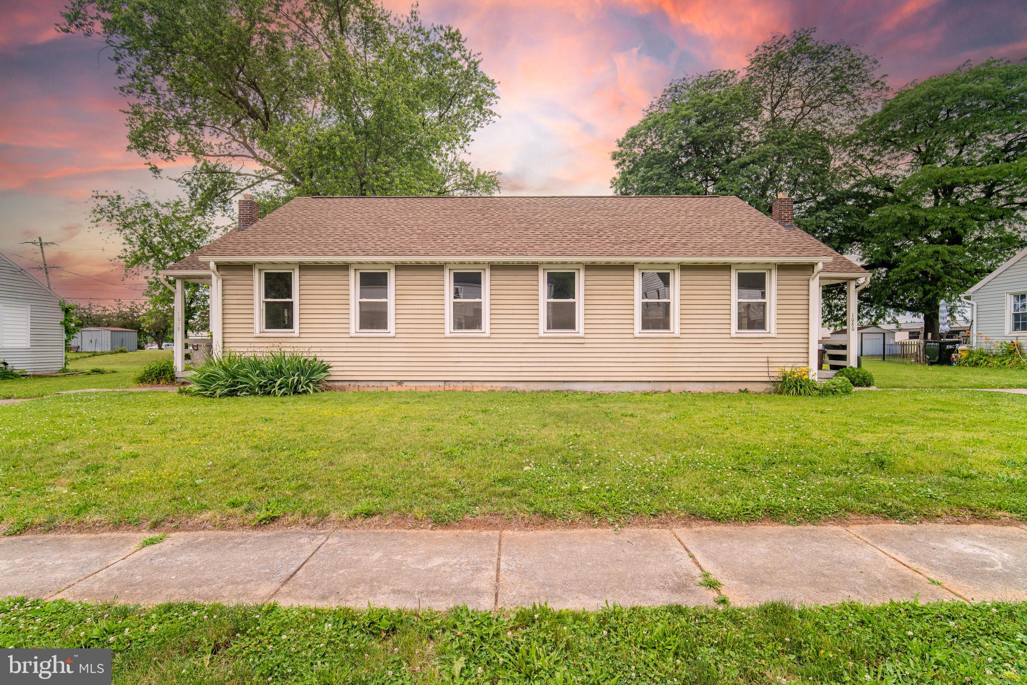 Live in one unit. Let the other help pay the mortgage!
This is 1078-1080 Kelly Drive in the Fireside neighborhood of York.
If you've been looking for an affordable path into real estate ownership while creating additional income, this 2-unit is a must-consider!
This duplex offers two simple one-bedroom units, making it an ideal opportunity for someone just starting out. Live in one side and rent the other to help offset expenses, or perhaps have a friend or family member close by while still maintaining your own space.  Utilities are separated out, every landlords' dream!
The property has seen many updates and maintenance over the past several years. The roof was replaced in 2022, and Unit 1080 features a remodeled kitchen complete with new cabinetry, tile flooring, laminate countertops, a stove replaced in 2023, and a refrigerator replaced in 2024. Unit 1078 has been updated with new luxury vinyl plank flooring, giving the space a fresh feel.
Outside, you'll appreciate the generously sized yard shaded by mature trees. There's plenty of room to relax, entertain, or simply enjoy some outdoor space. A storage shed provides additional room for tools, lawn equipment, or seasonal items.
The location can’t be beat for convenience. Situated in York's Fireside area, you'll enjoy the convenience of suburban living with sidewalks and countless amenities nearby. Those who enjoy their dose of nature will appreciate being close to Lincoln Park, Noonan Fields, Farquhar Park, and Kiwanis Lake. Grocery shopping is easy with both ALDI and Weis Markets nearby. When it's time to grab dinner, favorites like Chick-fil-A, Mission BBQ, and many other restaurants are just minutes away. Downtown York's restaurant and nightlife scene is also a short drive away.
For commuters, Route 30 is practically around the corner, and I-83 is less than five minutes away, making travel throughout York and beyond simple and convenient.
Whether you're looking to reduce your housing costs, begin building wealth through real estate, or add a property to your portfolio, 1078-1080 Kelly Drive is an opportunity worth exploring. Schedule your private showing today!