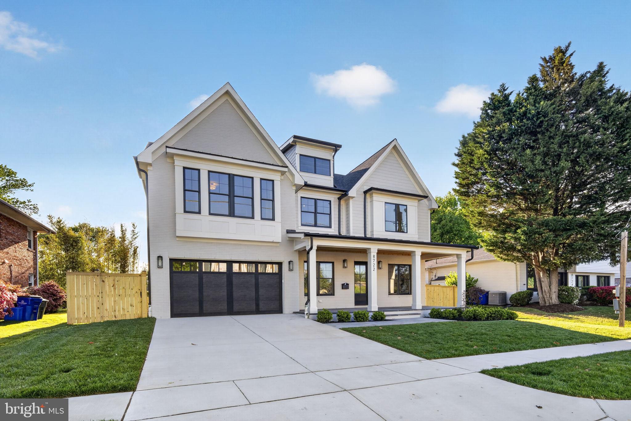 Brand-new construction in Bradmoor, delivered turnkey in the Walt Whitman school cluster.
8722 Ewing Drive is a new 5-bedroom, 5.5-bath home from ERB Properties offering 5,703 finished square feet across three levels — a level of space, finish, and functionality that’s increasingly hard to find as a complete package in this part of Bethesda.
The main level opens through a covered front porch into a center-hall layout with separate living and dining rooms, an open kitchen anchored by an oversized island that flows into the breakfast area and family room, and a true guest suite with full bath. A covered rear patio extends the family room outdoors, and a dedicated mud room connects to the two-car garage.
Upstairs, every bedroom has its own private full bath. The primary suite features dual walk-in closets and a spa-style bath with soaking tub and separate shower. The three secondary bedrooms each have en-suite baths of their own — no shared hall baths, no morning bottlenecks. A central loft serves as a second living area or homework zone, and the laundry room is on the bedroom level.
The finished lower level adds a fifth bedroom with full bath, a generous rec room, a yoga or flex room, and ample storage — flexible space for a home gym, media room, au pair suite, or long-term guests.
Bradmoor falls within the Bradley Hills Elementary, Thomas W. Pyle Middle, and Walt Whitman High School boundaries — verify with MCPS. You’re minutes from downtown Bethesda, NIH, Suburban Hospital, Montgomery Mall, and the Capital Crescent Trail, with quick access to I-270, I-495, and a straightforward commute into DC via Wisconsin Avenue or Old Georgetown Road.