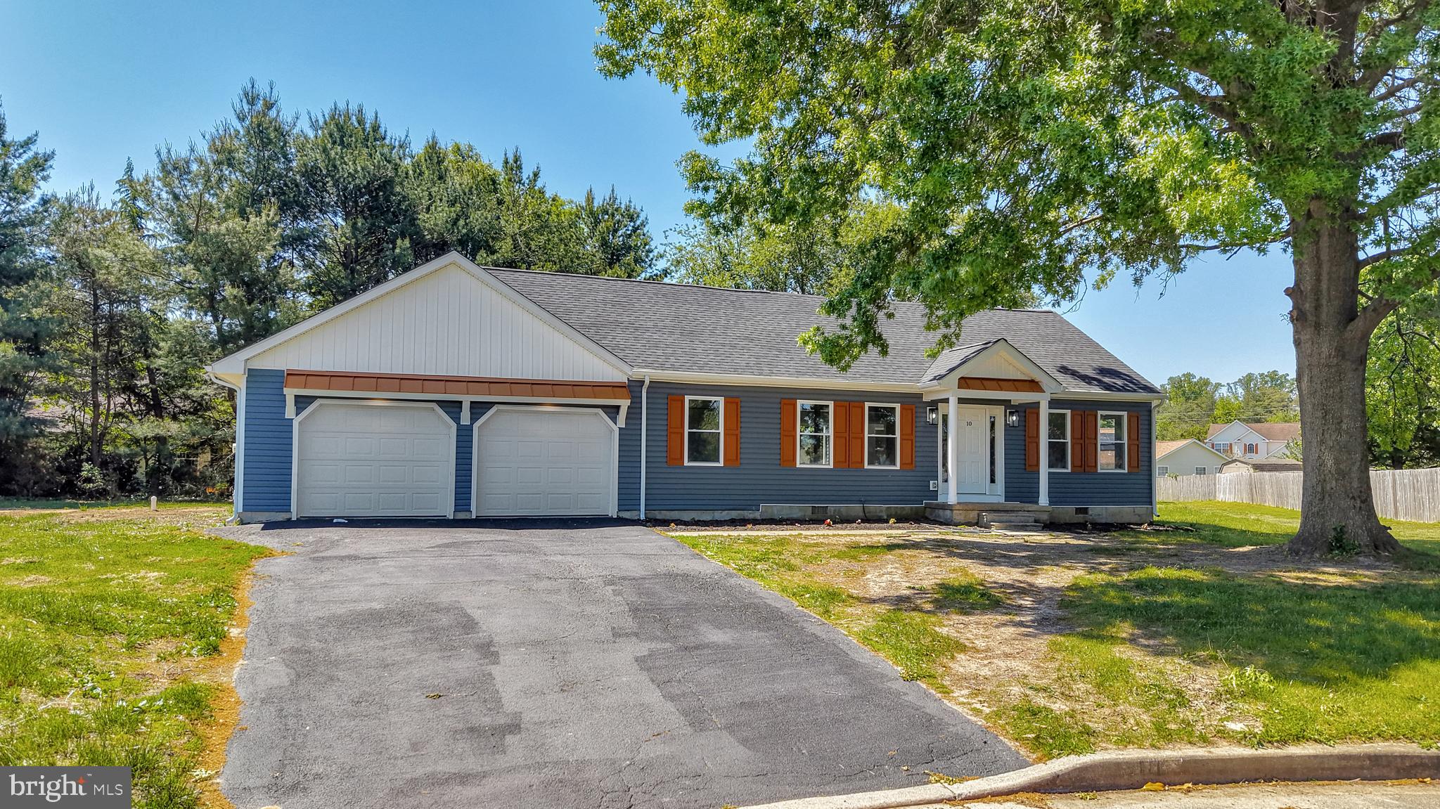 This charming home in the desirable Tamarac subdivision (and in Caeser Rodney school district), offers a perfect blend of comfort and modern living. With 1,821 square feet of thoughtfully designed space, this residence features four spacious bedrooms and two full bathrooms, making it ideal for both relaxation and entertaining. Step inside to discover a warm and inviting atmosphere, highlighted by beautiful laminate plank flooring that flows seamlessly throughout the home. The heart of the home is the well-appointed kitchen, equipped with sleek stainless steel appliances, including an electric oven/range, refrigerator, microwave, and dishwasher. A convenient pantry provides ample storage for all your culinary needs. The main floor laundry adds to the ease of living, ensuring chores are a breeze. Enjoy the convenience of an oversized attached garage with space for two vehicles, along with additional driveway parking. Set on a generous 0.39-acre lot, this home offers plenty of outdoor space for gardening, play, or simply enjoying the fresh air. The property has undergone major renovations in 2026, ensuring modern comforts and style throughout. With its inviting layout and thoughtful features, this home is ready to embrace new memories. Experience the perfect blend of comfort and functionality in a location that feels just right. Don’t miss the opportunity to make this delightful residence your own!