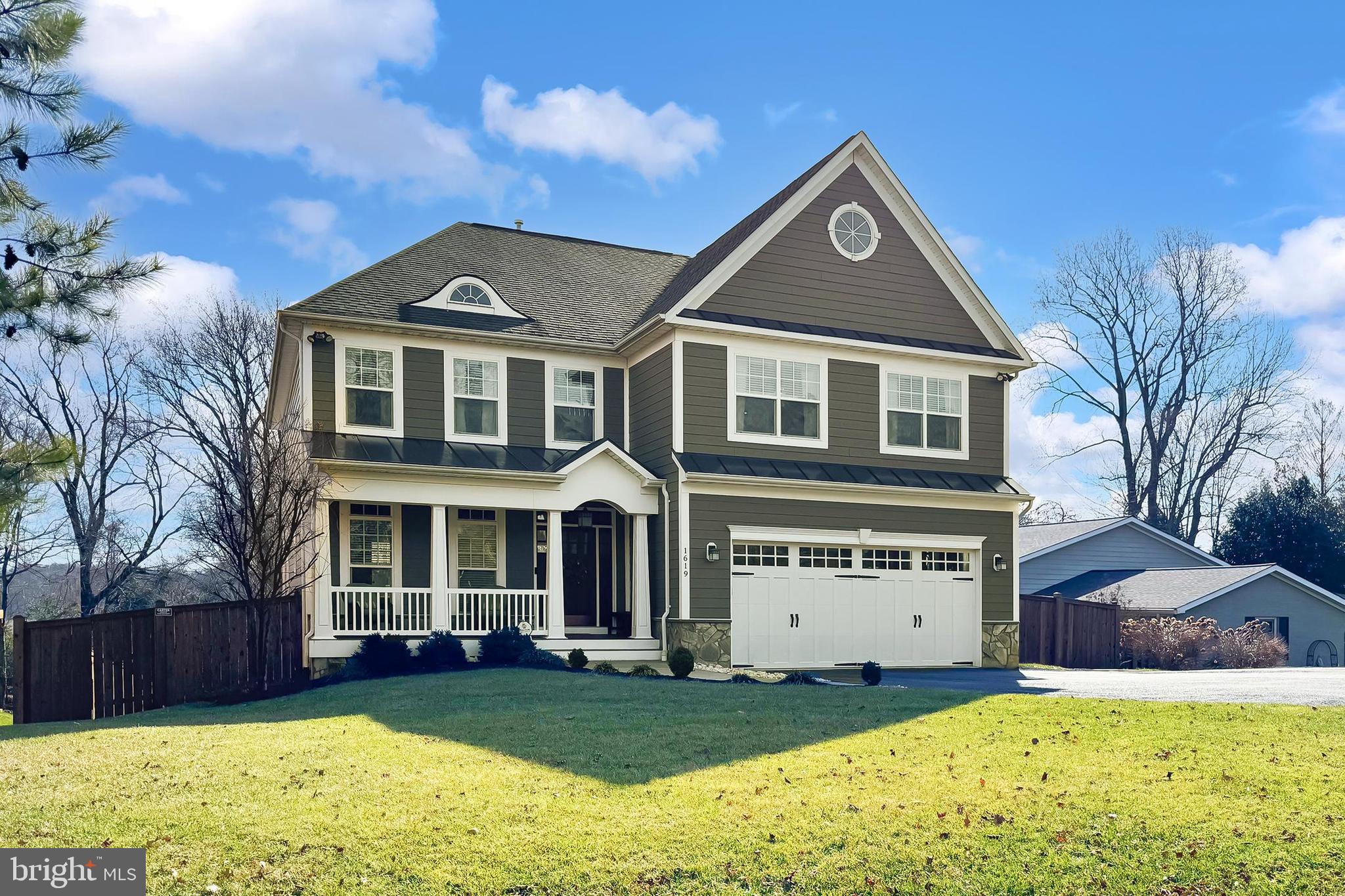 Welcome to 1619 Kirby Road in McLean, Virginia! Nestled in the desirable Chesterbrook community, this distinctive 5 bedroom, 4.5 bath Craftsman home is graced by an abundance of striking design features that put it in a class of its own. A tailored exterior with front porch entrance, 2-car garage, composite deck, fenced-in yard, a wide-open floor plan designed for entertaining, a spectacular gourmet kitchen, decorative moldings, elegant lighting, and an abundance of windows are only some of the fine features that make this half acre property so desirable. Rich hardwood floors greet you in the foyer and usher you into the spectacular two-story great room where a floor-to-ceiling stacked stone wood burning fireplace serves as the focal point. Ease into the formal dining room that is highlighted by a candelabra fusion chandelier, beamed ceiling, and decorative columns creating a visual boundary. Here, French doors open to the composite deck partially covered with a full pergola providing ample space to relax in the shade. The uncovered portion of the deck offers a perfect space for grilling and connects to the descending stairs to the enduring concrete patio, verdant lawn, gardener's shed, and privacy fencing—seamlessly blending indoor and outdoor entertaining or simple relaxation. Back inside, the gourmet kitchen will please the sophisticated chef with striking quartz countertops, designer backsplash, handcrafted cabinetry, and stainless-steel appliances including a gas cooktop, suspended vented hood, and French door refrigerator. A center island with prep sink provides an additional working surface and bar-style seating, as recessed and pendant lights strike the perfect balance of ambience and illumination. Fine craftsmanship continues in the primary suite featuring a tray ceiling, room for a sitting area, two walk-in closets, and an en suite bath boasting dual granite-topped vanities plus bench seating, a sumptuous jetted tub, frameless ultra shower, and spa-toned tile flooring and surround—the finest in personal pampering! A laundry center with modern machines and a powder room with pedestal sink complement the main level.  Upstairs, a large room currently being used as a rec room could potentially serve as an alternate primary suite. This room harbors a walk-in closet and full bath updated to perfection. The second level is completed by a junior suite with a private bath, and two additional bright and cheerful bedrooms sharing access to a beautifully appointed hall bath. The lower level delivers an expansive unfinished area that provides ample storage solutions and is just waiting for your personal touch. ***Note:  The built-in commercial kitchen equipment including the prep station in the basement does not convey with the list price.  However, sellers are willing to negotiate sale of this equipment/prep station on a case-by-case basis.***This home is like a private oasis and makes you feel many miles away from the hustle and bustle of Northern Virginia, yet is centrally located near the Dulles Access Road, I-495, Express Lanes, Route 7, Georgetown Pike, Route 123, George Washington Parkway, and the Silver Line Metro. It is an urbanite’s dream with endless shopping, dining, and entertainment experiences in nearby Tysons Corner Center and Galleria plus outdoor enthusiasts can take advantage of Linway Terrace Park, Wolf Trap Center for the Performing Arts, the W&OD Trail, and the Tysons bike path and urban trail—there’s something here for everyone! For a suburban retreat that offers sophistication and comfort, you’ve found it. Welcome home!