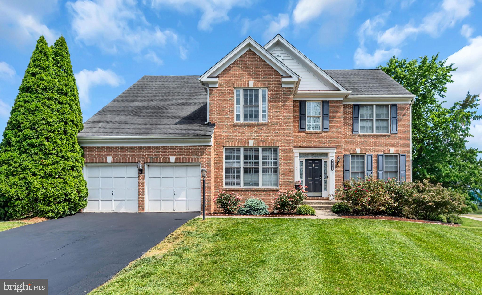 Stunning 5-Bedroom Brick-Front Colonial with Full In-Law Suite in Amenity-Rich South Riding
Welcome to this gorgeous 5-bedroom, 3.5-bath brick-front colonial offering over 4,100 finished square feet across three beautifully appointed levels. Freshly painted throughout with brand-new carpet on the upper and lower levels — completely move-in ready and showing like a model home.
A dramatic two-story foyer with gleaming hardwood floors sets the tone, flowing into elegant formal living and dining rooms with crown molding, wainscoting, decorative columns, and chair rail detail. The private main-level office is truly one-of-a-kind, featuring a full wall of custom built-in bookshelves with designer wood-paneled backing and plantation shutters — the perfect work-from-home retreat.
The gourmet kitchen is the heart of the home: crisp white cabinetry, Granite counters, large center island, glass subway tile backsplash, stainless appliances (gas range, double wall oven, French-door refrigerator), and a stainless vent hood. It flows seamlessly into a sun-filled breakfast nook with French doors and into a breathtaking two-story family room anchored by a corner gas fireplace, soaring windows, and French doors to the outdoors.
Step outside to an entertainer's dream: a spacious wraparound deck with a charming covered gazebo, a stunning all-season sun room with vaulted ceiling, skylights, panoramic windows, and a wood-burning stove, a rustic screened porch on the lower level, an expansive flagstone patio, and a huge fully fenced backyard backing to mature trees — complete with built-in basketball area and a custom playhouse.
Upstairs, the luxurious primary suite is a true sanctuary — vaulted ceiling, second gas fireplace, and a spa-style en-suite bath featuring a skylight, jetted soaking tub, separate shower, dual vanity, private water closet, and a spacious walk-in closet with custom organizers. Three additional generously sized bedrooms, a full hall bath, and a dedicated upper-level laundry room complete this level.
The walk-out lower level lives like a private in-law or au-pair apartment with its own separate stair access — featuring a second full kitchen with granite counters and stainless appliances, separate laundry, a large master bedroom with full bath, additional bedroom, an expansive recreation room showcasing rich custom mahogany wainscoting. Ideal for multi-generational living, extended-stay guests, or rental potential.
Additional highlights include a 2-car garage with built-in storage cabinets, premium fenced lot on a quiet street, and access to all of South Riding's resort-style amenities — pools, tennis, golf, parks, miles of walking trails, top-rated Loudoun County schools, and easy access to Dulles, Route 50, and major commuter routes.
A rare opportunity to own a turn-key home with true multi-generational flexibility and exceptional outdoor living in one of Loudoun County's most sought-after communities.