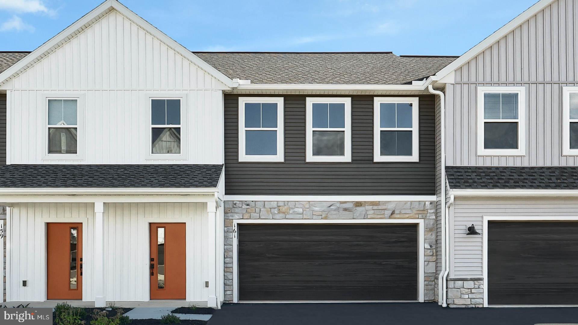 This 2-story townhome includes a 2-car garage, a 10 ft basement with outdoor access, and durable vinyl plank flooring throughout the first floor. The dining area, with sliding glass door access to the rear deck, opens to the sunny family room. The kitchen features stainless steel appliances, quartz countertops, and a large center island. The 2nd floor boasts an owner’s suite with an expansive closet and private bathroom, 2 additional bedrooms, a full bathroom, and a convenient laundry room.