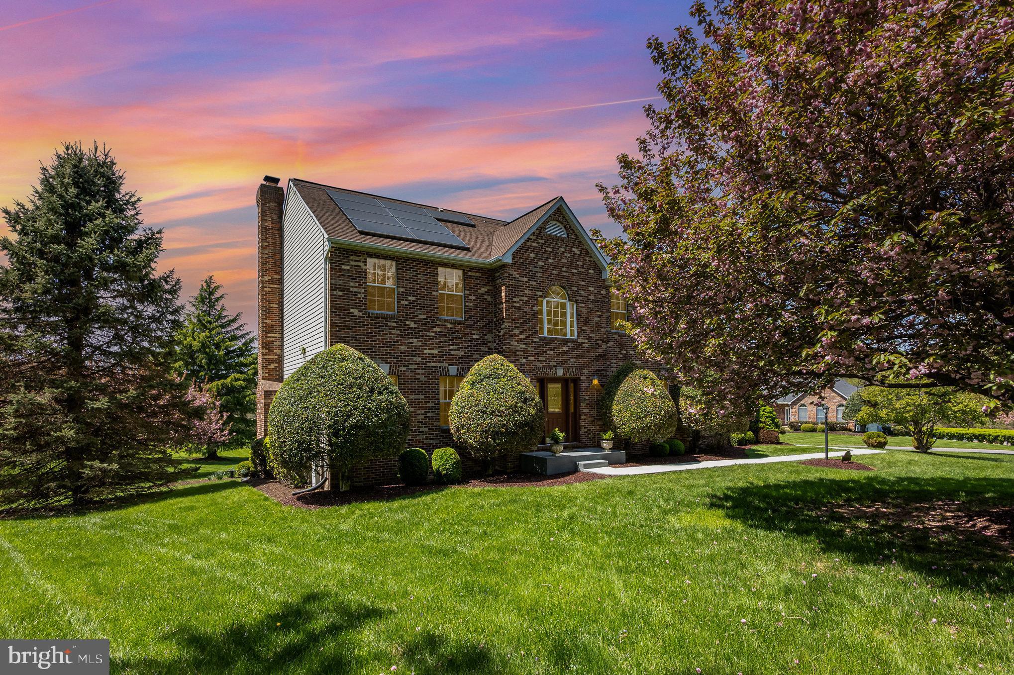 Stunning home in the highly sought-after Mardella Run estate homes community located in Woodstock Maryland. Step inside to discover natural hardwood floors in the foyer, living and dining area plus the beautifully redecorated powder room. Your first level floor décor features a spacious family room with a raised-hearth brick fireplace adjacent to the breakfast area complete with an intercom system. The home also features an adjoining sunroom with an overhead vaulted ceiling fan, skylights and plantation shutters allowing natural light streams and plenty of sunshine creating a warm and relaxing atmosphere. Security storm doors access the step-down deck from the sunroom while sliding glass doors also give additional access to the deck from the breakfast area overlooking blooming landscaped grounds and rolling hills. The kitchen displays decorative granite countertops with backsplash, hanging light pendants and plenty of counter and storage spaces. Stainless steel appliances include a dishwasher, cooktop with range hood, refrigerator and a built-in wall oven/microwave combo unit. The main-level laundry/mud room with washer and dryer adds convenient access to the home via the two-car garage leading directly into the kitchen to store and drop off your groceries. The second level primary suite upstairs offers a cathedral ceiling with an adjoining sitting room and spacious walk-in closet, an en-suite bathroom with double vanity, separate shower with dual shower heads, and a jacuzzi bathtub with four soothing multi-directional jets. Inside features a toilet room and linen closet. Three additional bedrooms, a hall bath and an additional linen closet complete the upper level. The finished basement features walk-out access to the backyard and lawn patio providing even more outdoor living space under the deck. Within the lower level a large open recreational space with wet bar is separated from an enclosed theatre room or man cave with a custom-made sound system and dedicated circuitry ideal for entertainment and dining in. In addition, composite may be used for or used as a fitness area. An additional full bath and generously sized den make this lower-level ideal for guests or creating a personal hobby space, game room or home office. With ample storage, this basement facilitates and accommodates all your family needs while maintaining the luxury and comfort of the home.