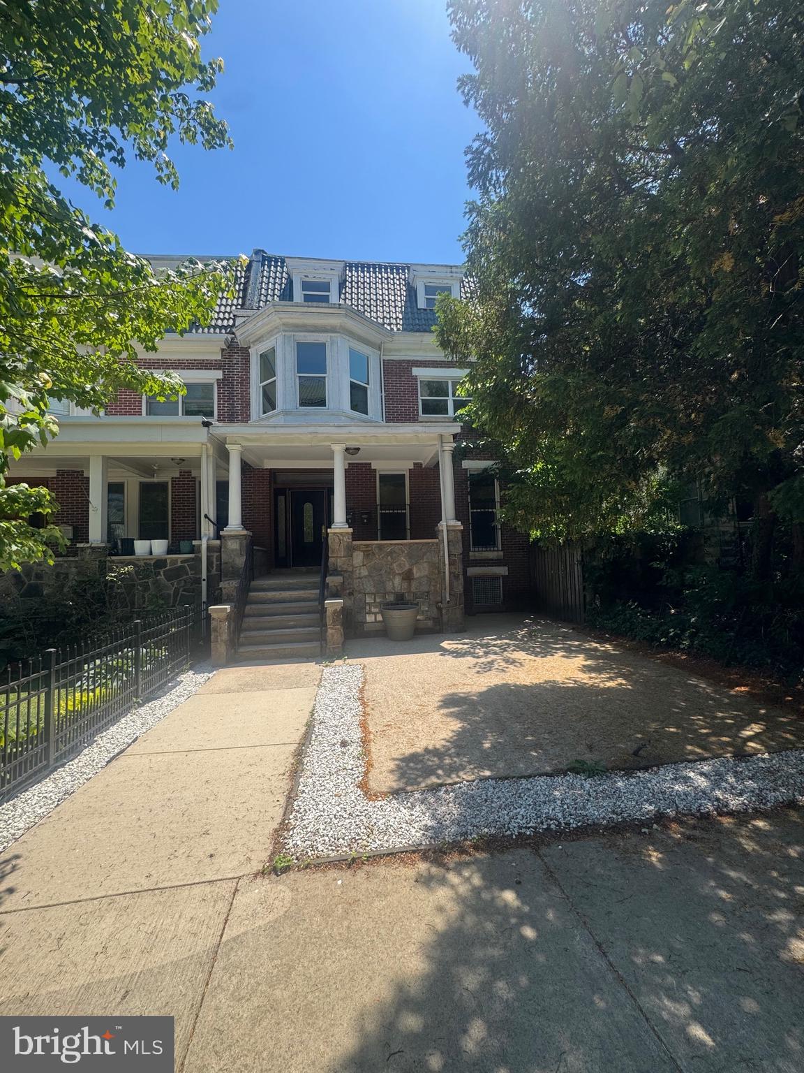 Welcome to this beautifully updated three-story home, offering a perfect blend of modern comfort and versatile living spaces. On the lower level, you’ll find a fully updated mother-in-law suite, complete with a full kitchen, one bedroom, one bathroom, and its own private entrance, perfect for guests or multi-generational living. The second floor welcomes you with an open-concept design, featuring two bright bedrooms, a full bathroom, and a charming sunroom bathed in natural light. Ascend to the third floor, where a luxurious primary suite awaits—complete with an ensuite bathroom and a private walkout to a rooftop deck, ideal for relaxing evenings under the stars. Every floor boasts thoughtful upgrades, ensuring a stylish and welcoming atmosphere throughout. This home is a true urban oasis—schedule your private tour today!