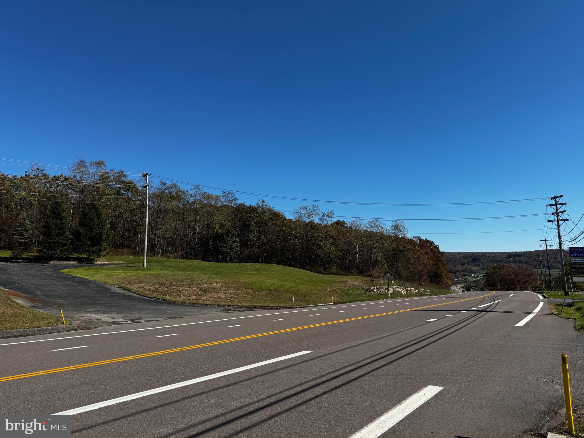 RARE property alert! 8.32 acres, Deep Creek Lake Town Center zoning. Public sewer available (currently 6 IERUs), 500' of State Rt. 219 (Garrett Highway) road frontage, PLUS Deep Creek Lake & Wisp Ski Slope VIEWS are just some of the great qualities this property has to offer. Prime location in immediate Deep Creek Lake & WISP ski resort area for business, development, or personal use & enjoyment. Enjoy easy access to all of the surrounding businesses, restaurants, recreation, and amenities. Don't miss a chance at the endless opportunities this property has to offer. The possibilities of usage are as big as you can dream. Call today to see this once in a lifetime property! There are no buildings/improvements on property or any that convey.
