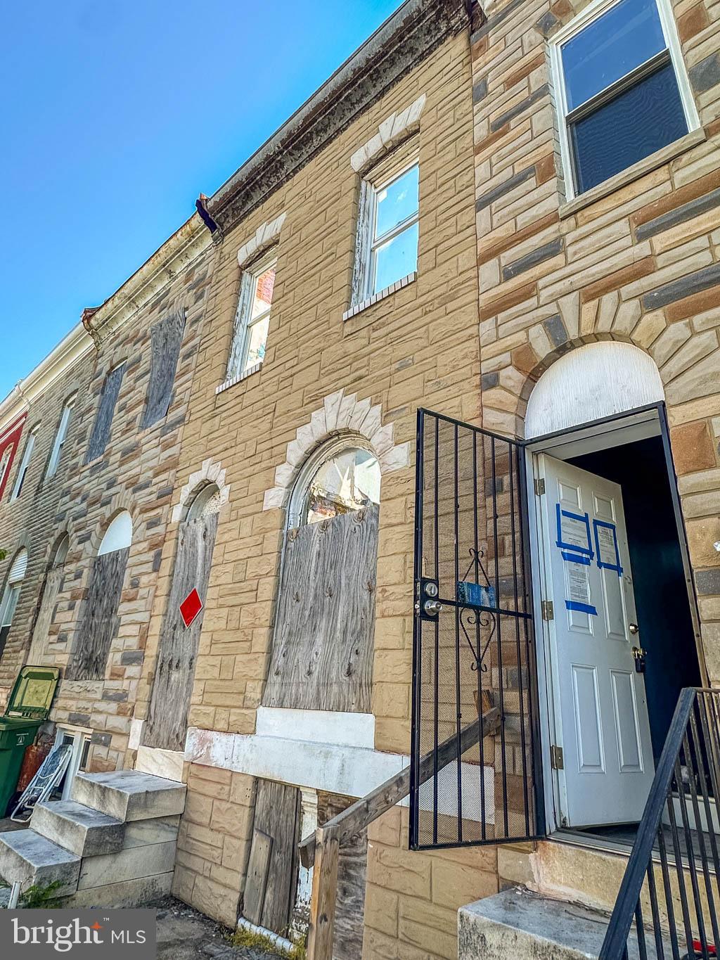 INVESTMENT OPPORTUNITY!  SPACIOUS TURN KEY ROWHOME!  Main level with a spacious living room and dining area, half bath, and kitchen, upper level with 3 bedrooms and 1 full bath, and an unfinished basement.  Sold As-Is.  Buyer will be responsible for clearing any vacant property notice after settlement if one exists.
