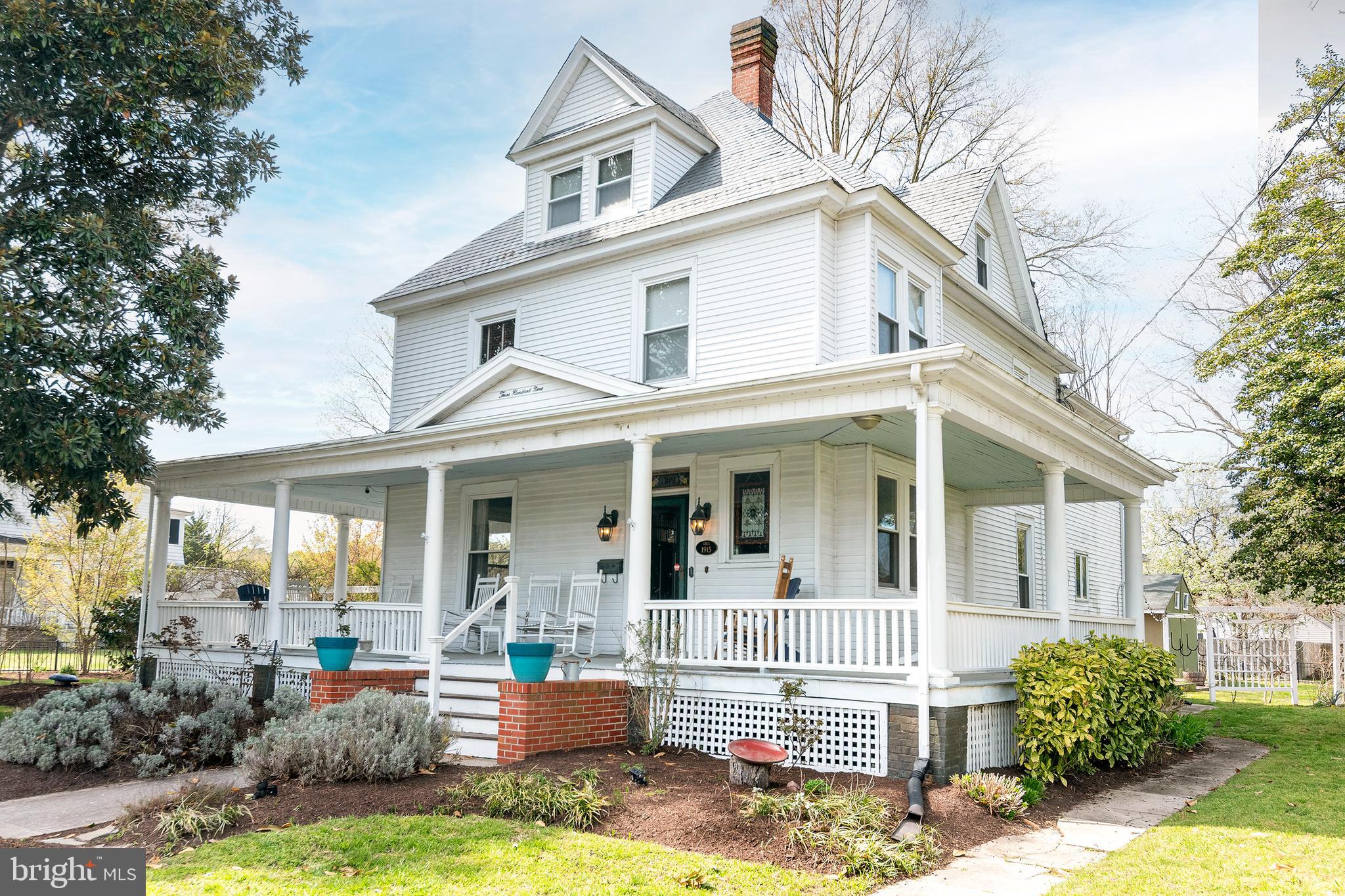 This is a beautifully updated and well-maintained Four Square located in Cambridge's Historic District. It is a grand house for entertaining both inside and out. In addition to the 5 bedrooms and 3.5 baths in the Manor House, the property boasts 2 additional buildings on the .57 acre lot filled with specimen flowers, shrubs and trees. 1 building, originally built as a Montessori school, is well suited as a studio, in-law suite, professional office space or Man cave.  It is currently registered and generating income as an Airbnb.
